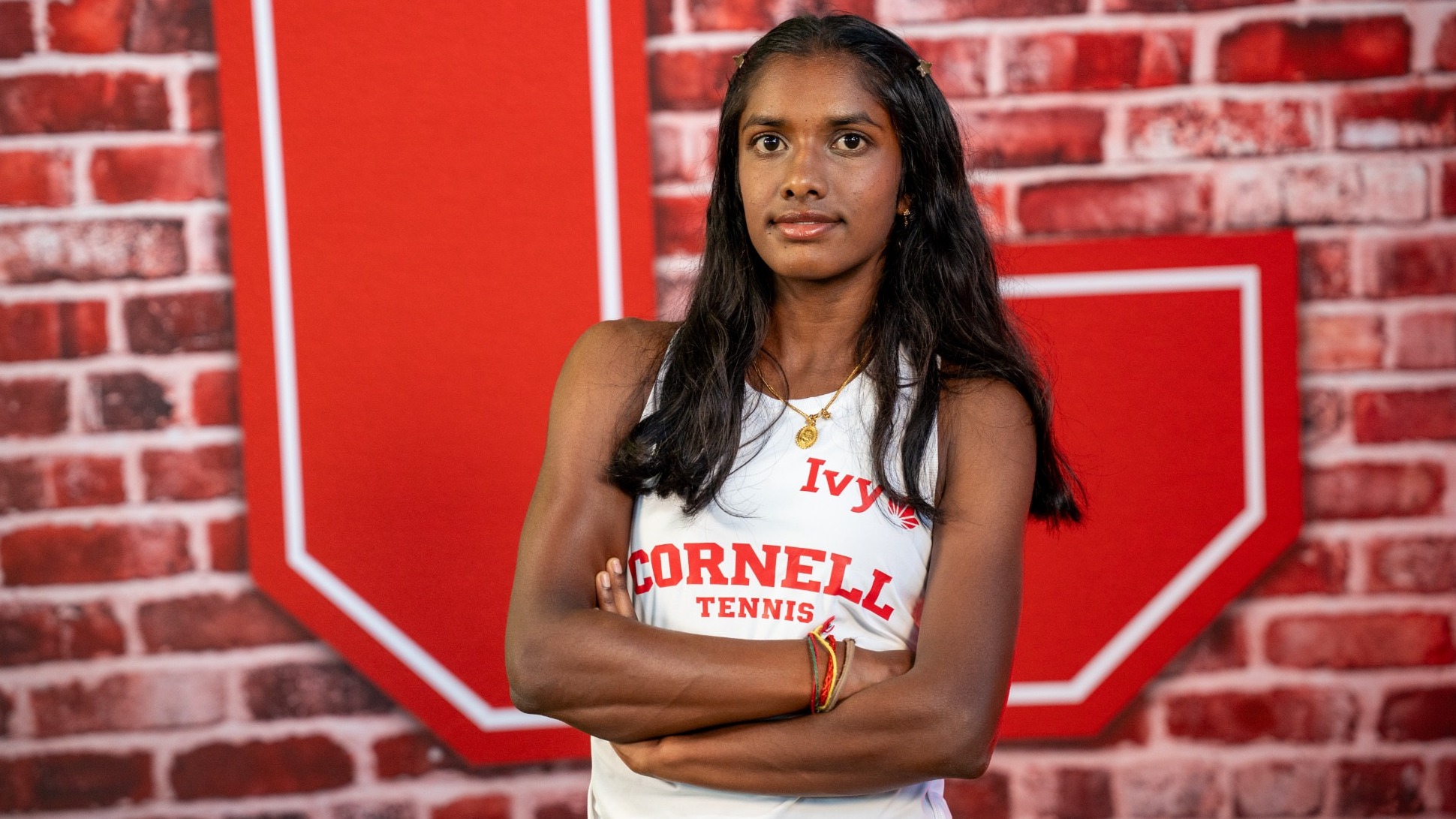 Cornell women's tennis freshman Tanika Saravanan poses for a media day photo inside Barton Hall for the 2026-27 academic year.