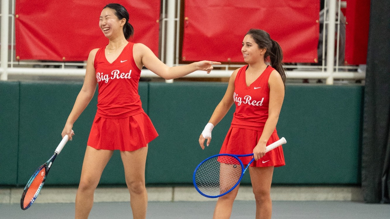 Cornell women's tennis doubles tandem Victoria Zhao and Andrea Martinez De Los Rios smile during match action against Princeton at the Reis Tennis Center in Ithaca, N.Y., on April 10, 2026.