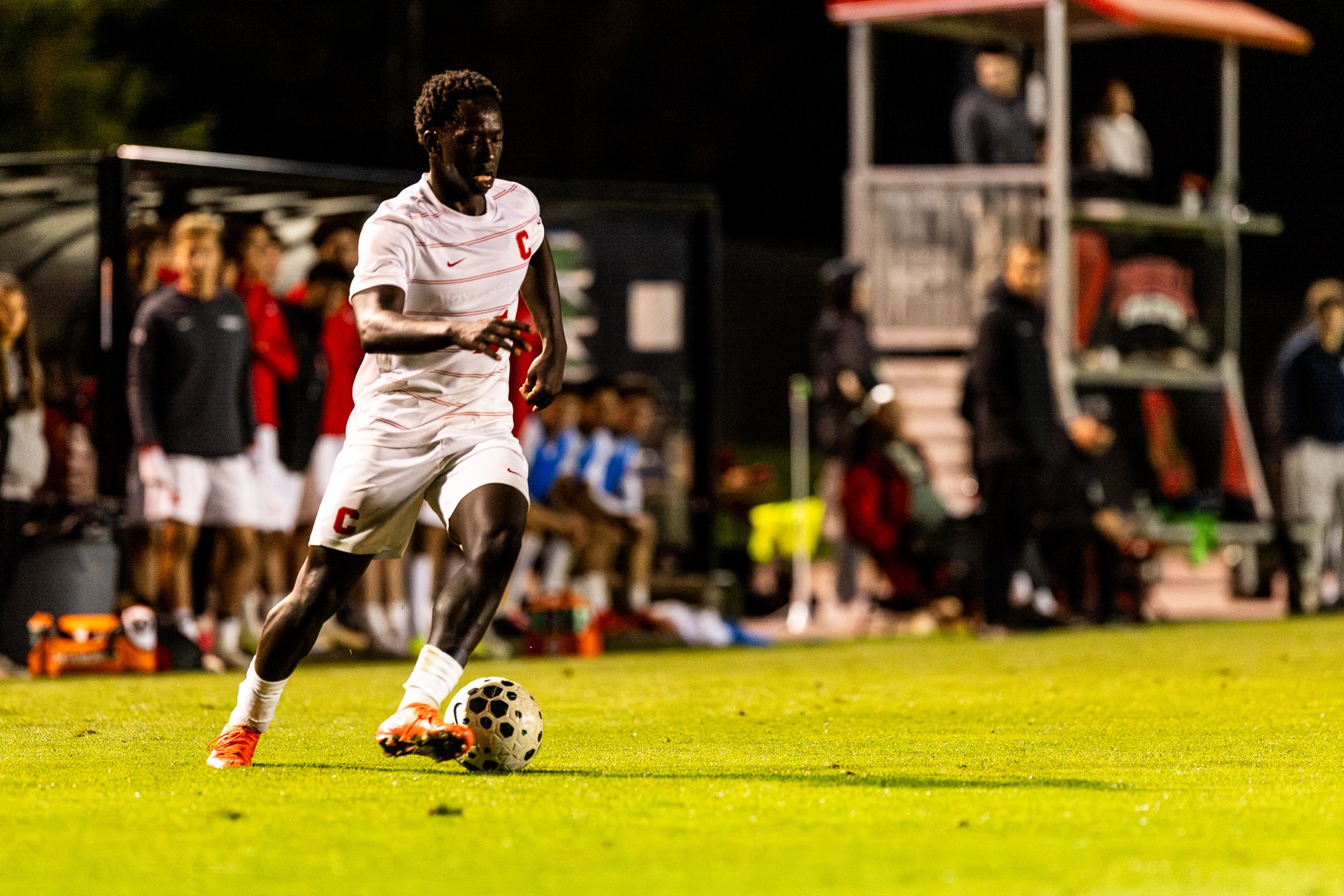 MSOC Calvin Momanyi dribbles the ball