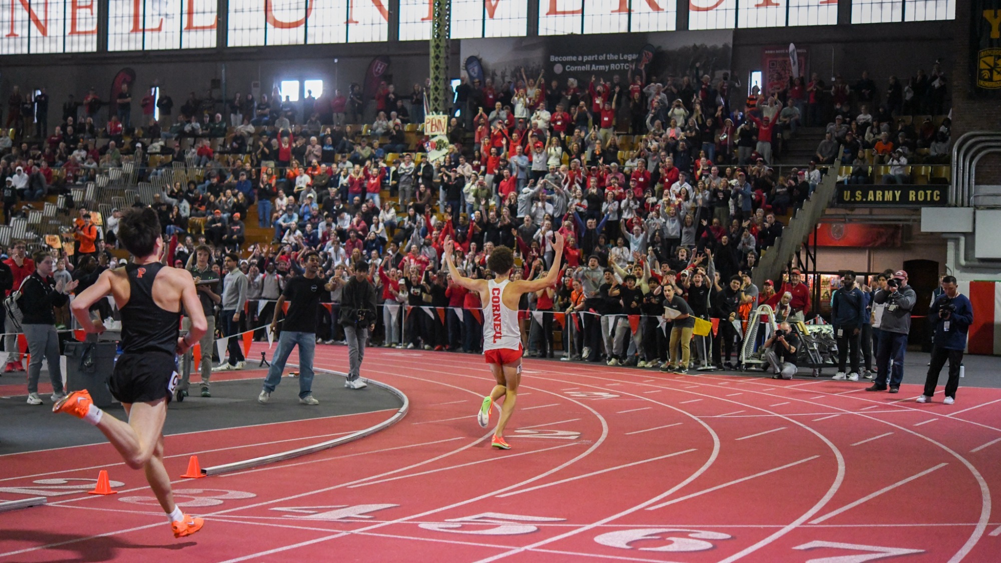 Pierre Attiogbe crosses finish line inside Barton Hall