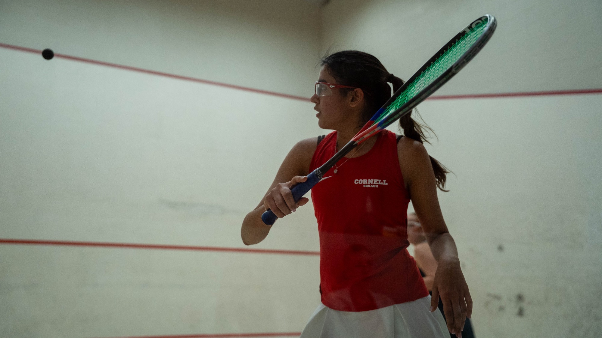Cornell junior women's squash player Saniya Jaggi goes to hit a squash ball during match action against Yale at the Belkin Squash Courts in Ithaca, N.Y., on Feb. 14, 2026.