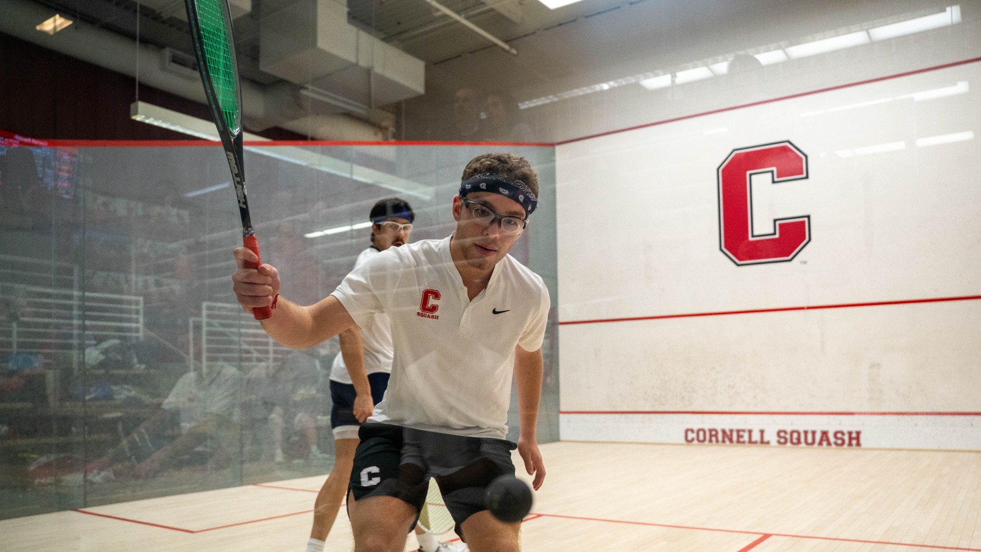 Cornell sophomore men's squash player Youssef Sarhan goes to hit a squash ball during match action against Yale at the Belkin Squash Courts in Ithaca, N.Y., on Feb. 14, 2026.