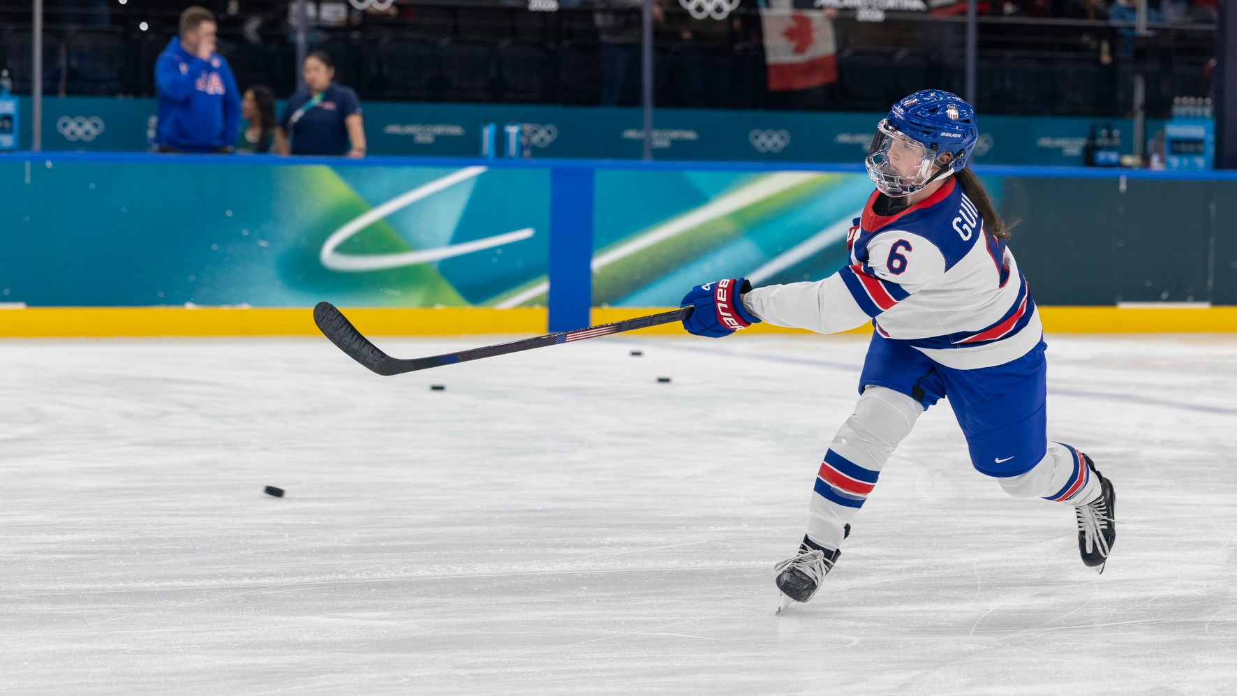 Rory Guilday shoots the puck at the 2026 Winter Olympic Games.