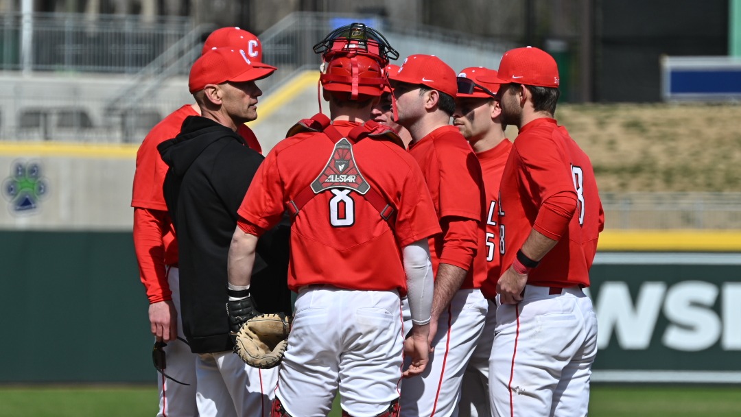Members of the Cornell baseball team, including head coach Dan Pepicelli, meet at the mound during game action against Boston College on Feb. 22, 2026, at Fifth Third Park in Spartanburg, S.C., in the Hub City Invitational.