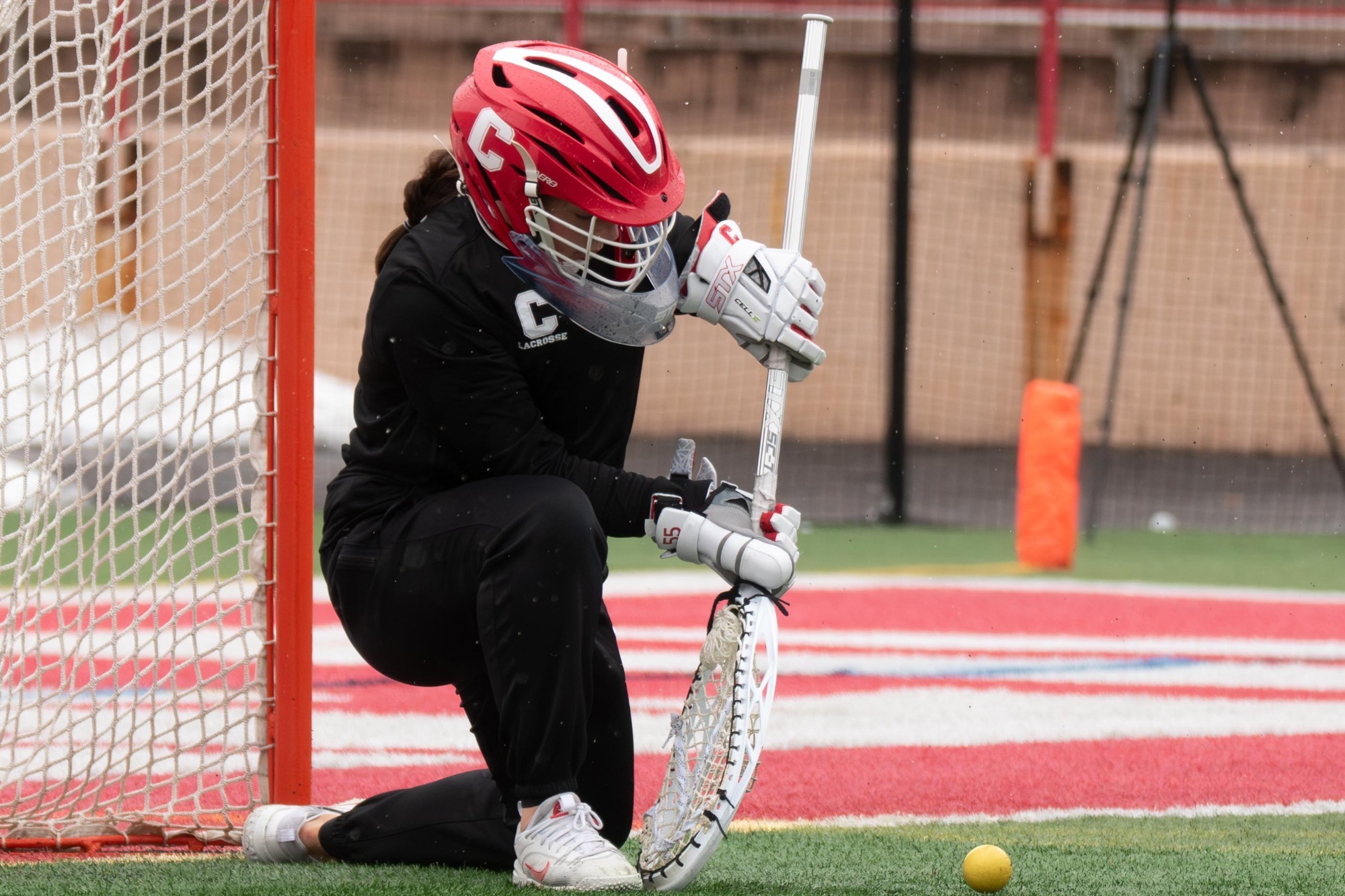 Women's Lacrosse Goalie warming up before game against JMU on Schoellkopf Field 02.22.26