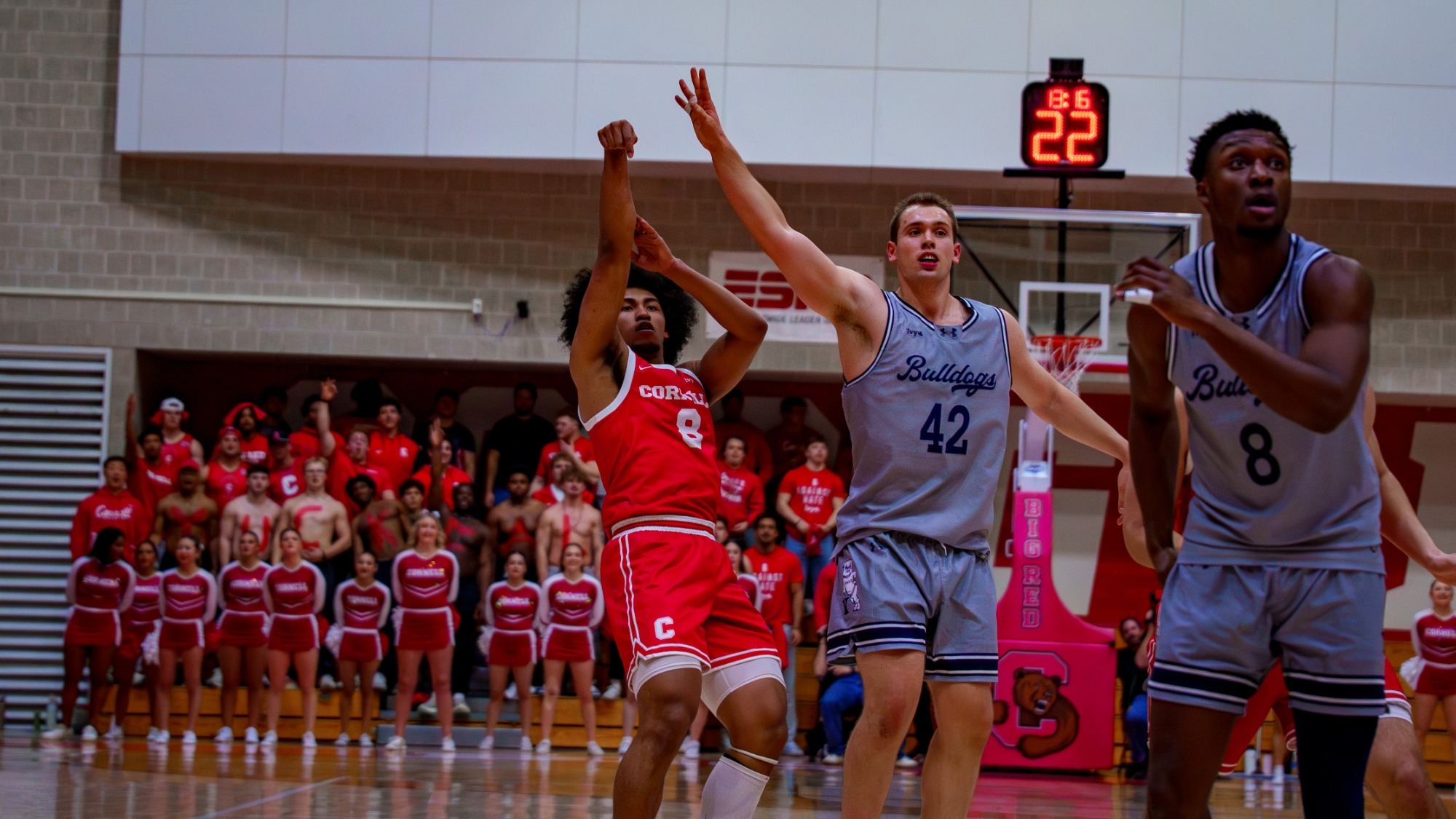 Adam Hinton attempts a 3-point shot over a Yale defender during Cornell's 72-69 victory on Feb. 27, 2026 at Newman Arena in Ithaca, N.Y