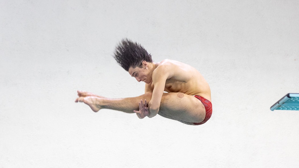 Men's swimming and diving competes at Teagle Pool.