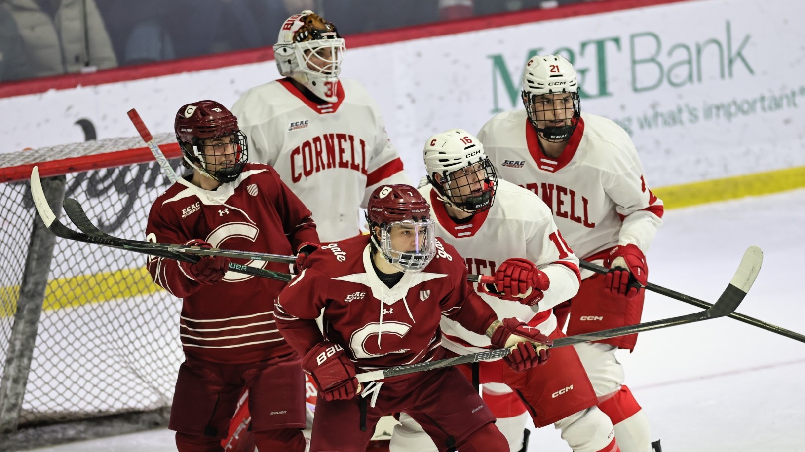 Members of the Cornell and Colgate men's hockey teams battle for position in front of Cornell's net during game action at Lynah Rink in Ithaca, N.Y., on Feb. 7, 2026.