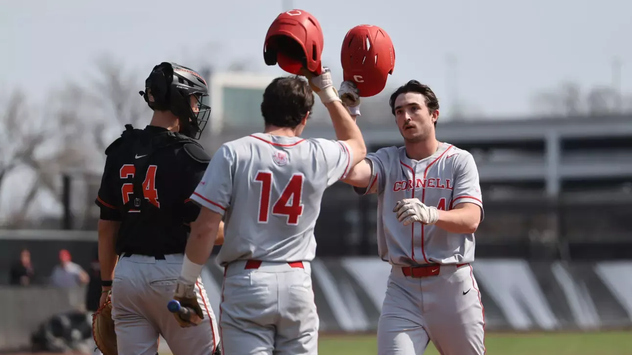 Cornell baseball freshman outfielder Jake Hower celebrates with junior infielder Kevin Hager after hitting a home run against Princeton at Clarke Field in Princeton, N.J., on March 22, 2026.