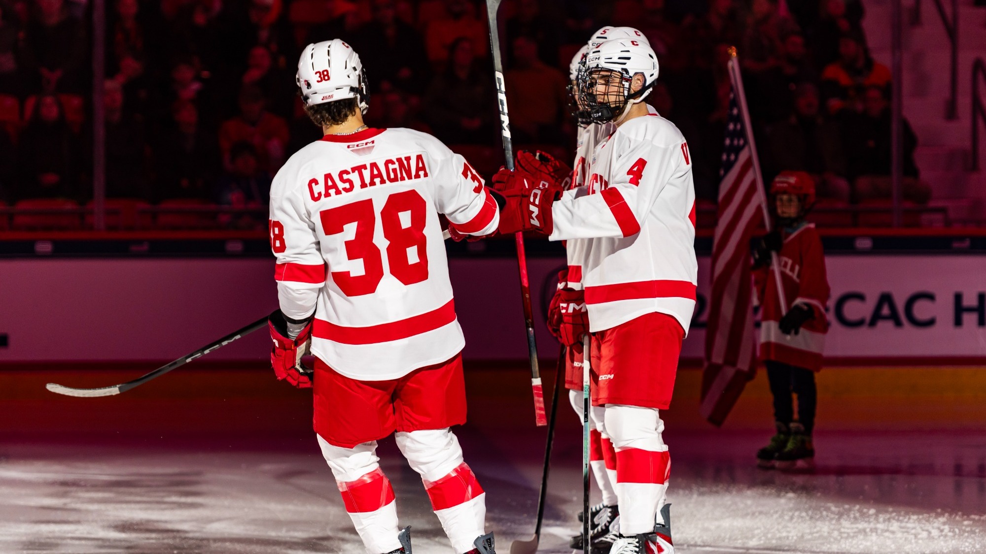 Cornell men's hockey junior forward Jonathan Castagna goes to fist bump teammates during pregame introductions before a game against Princeton on March 20, 2026, in Lake Placid, N.Y.