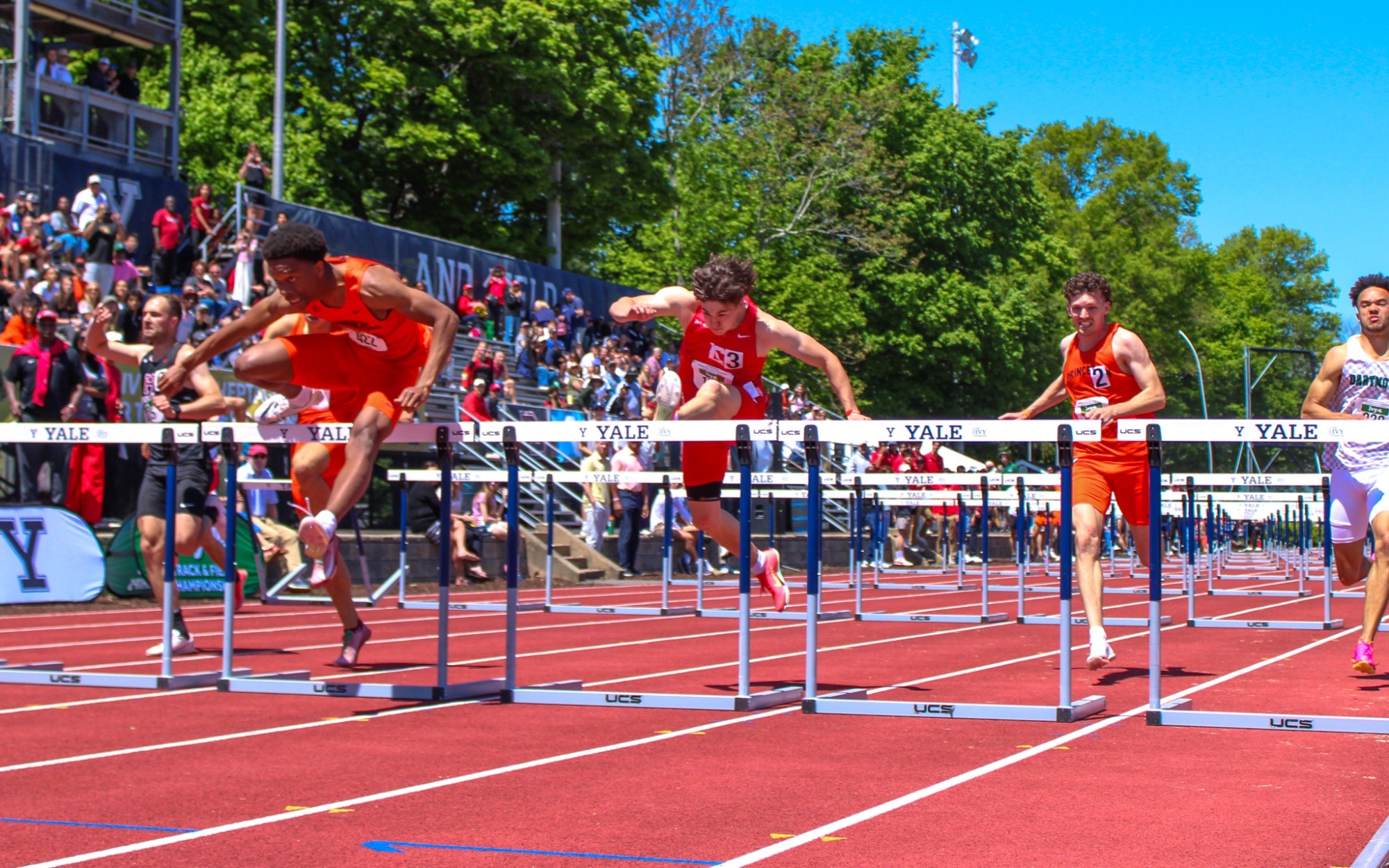 Ryder King competing in outdoor hurdles