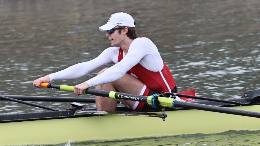 Cornell men's heavyweight rower Joe Savell rows during race action during the 2024-25 season.