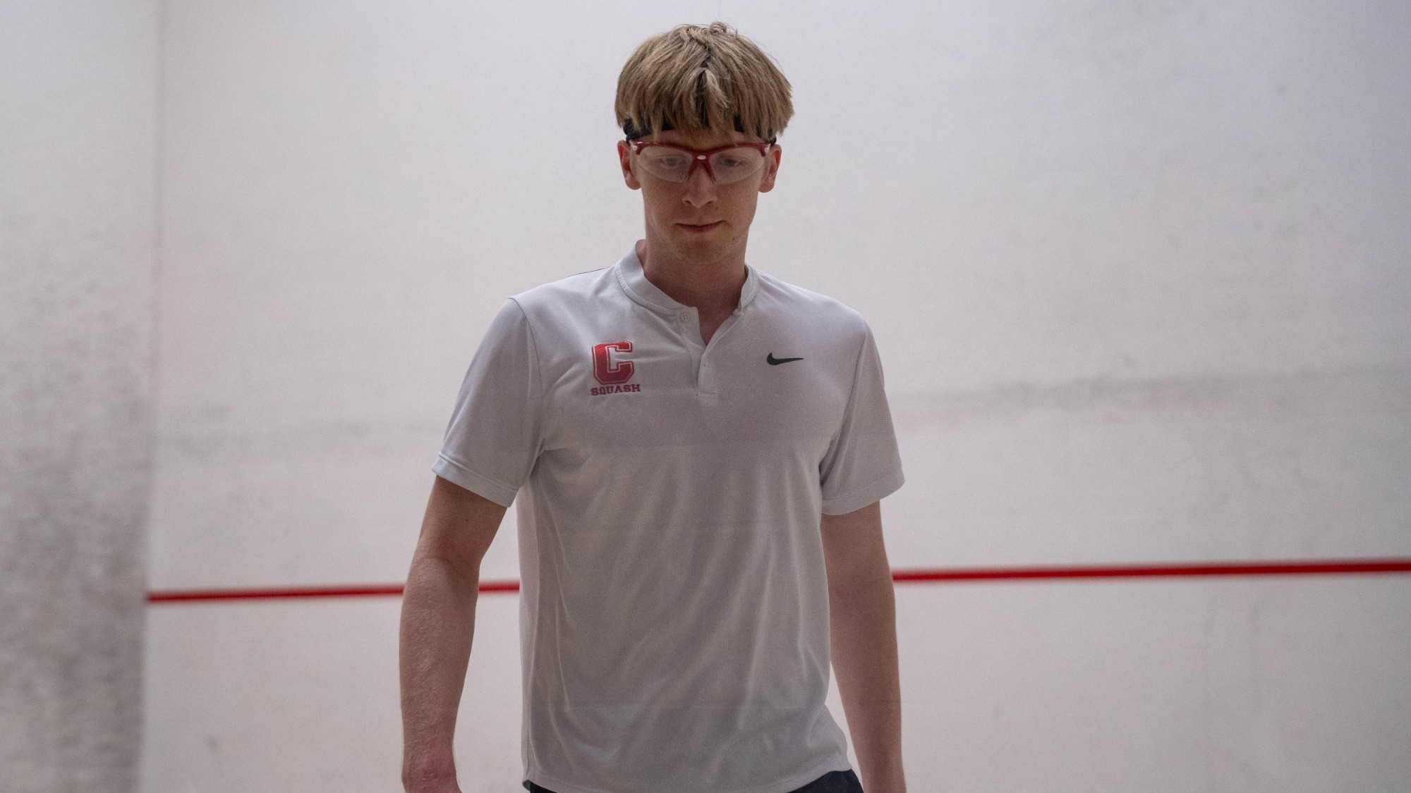 Cornell men's squash player Roman Bicknell stands inside the court during match action against Yale at the Belkin Squash Courts in Ithaca, N.Y., on Feb. 14, 2026.