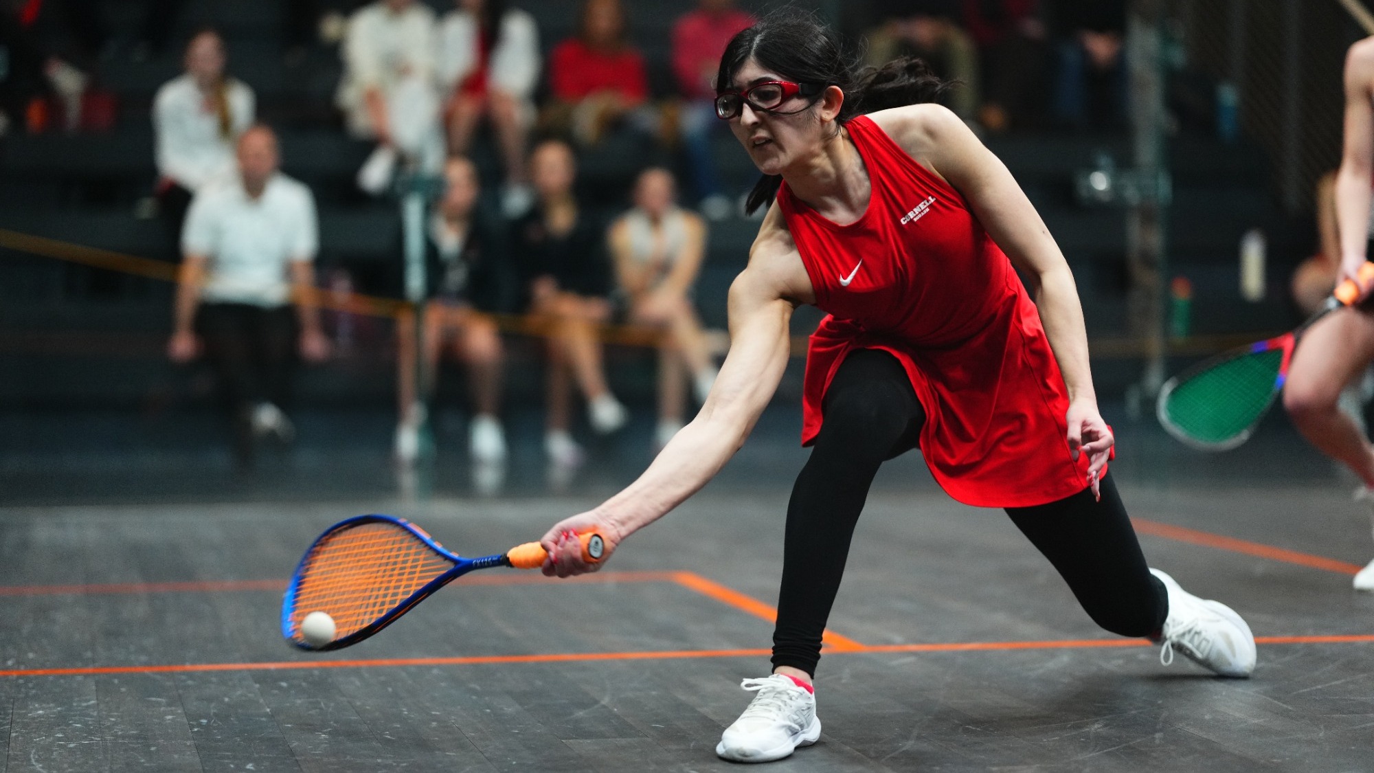 Cornell women's squash player Alysa Ali goes to hit a squash ball during match action against Princeton in the Ivy League Women's Squash Tournament on Feb. 21, 2026, in Princeton, N.J.