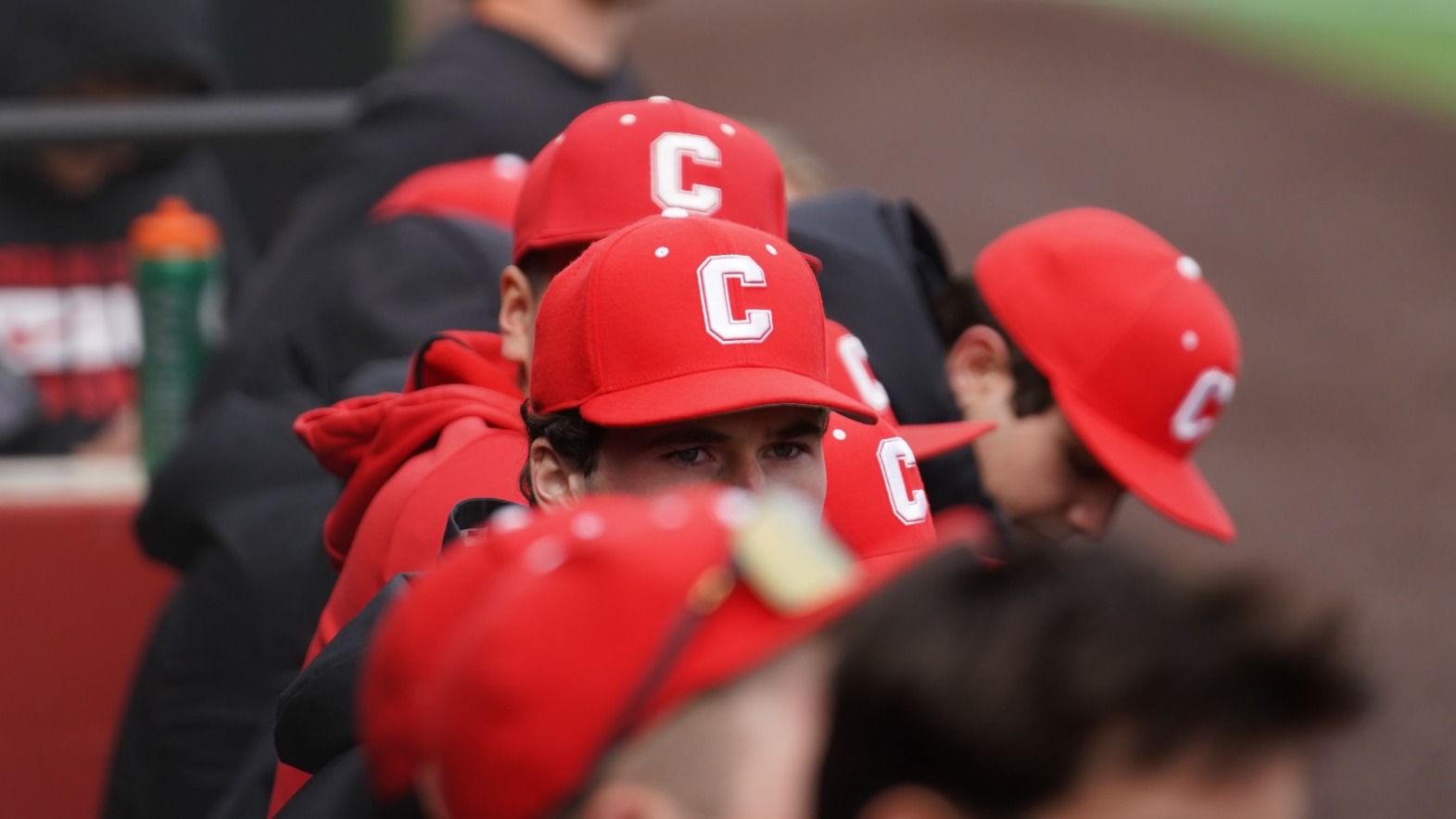 A close-up photo of Cornell baseball players in the dugout during game action against Harvard at Booth Field in Ithaca, N.Y., on March 29, 2026.