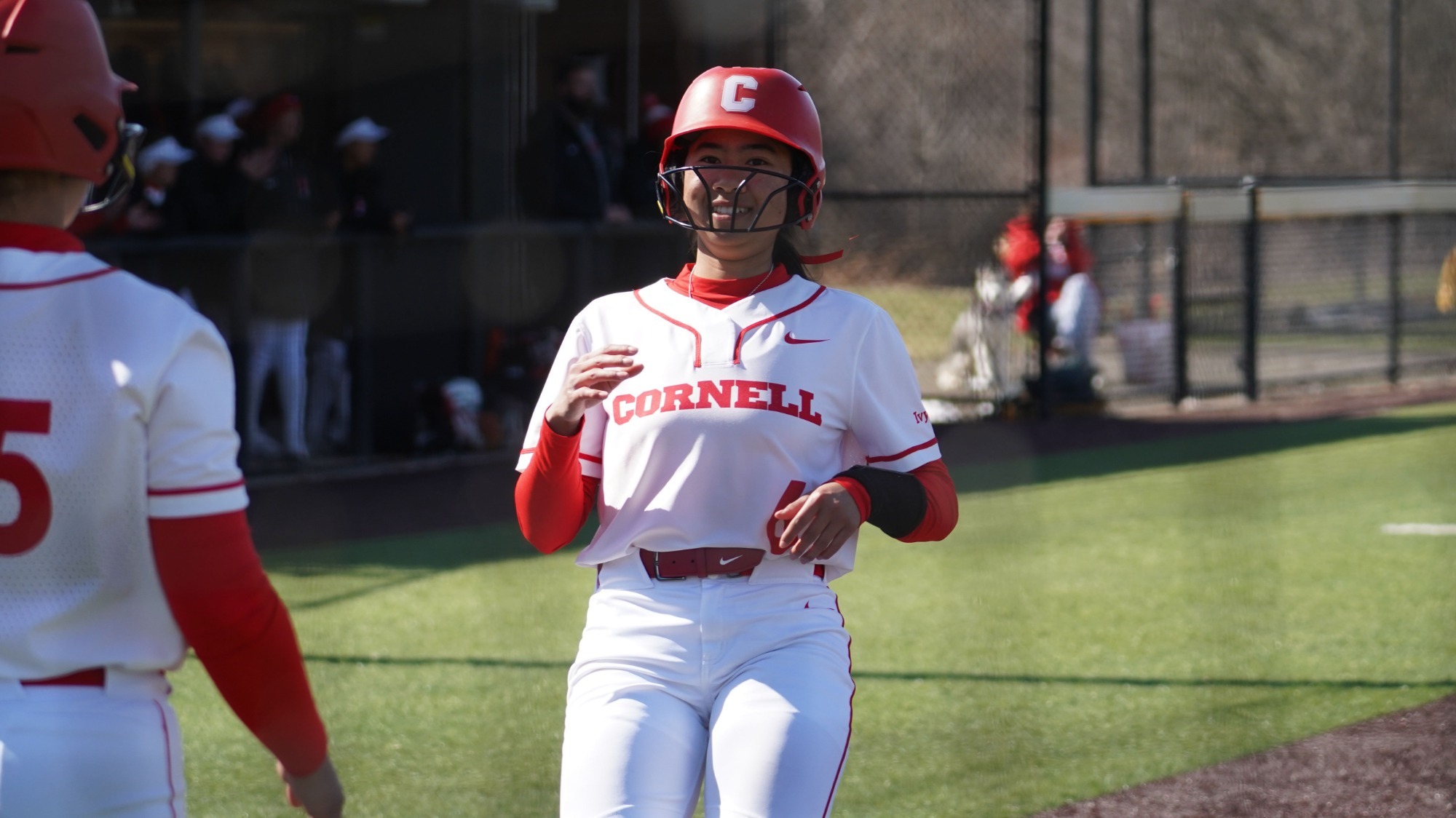 Charlize Cai runs to the home-plate at Niemand-Robison Field.