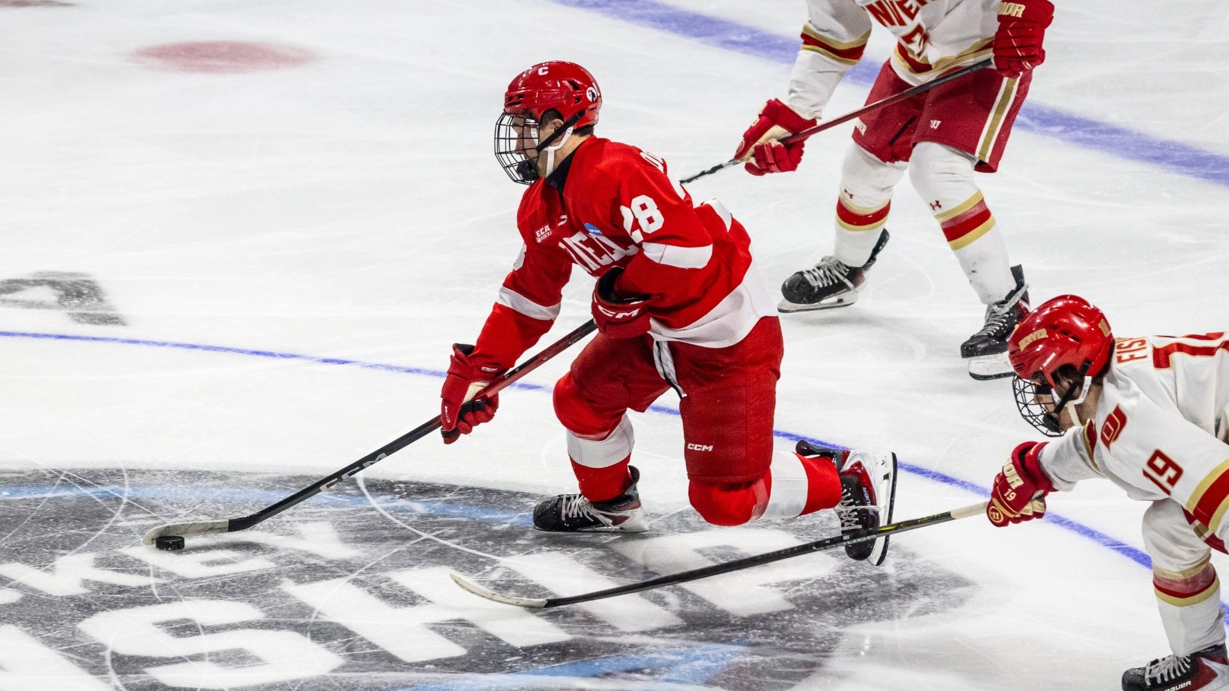 Cornell men's hockey senior forward Nick DeSantis carries the puck during game action against Denver at Blue Arena in Loveland, Colo., on March 27, 2026.