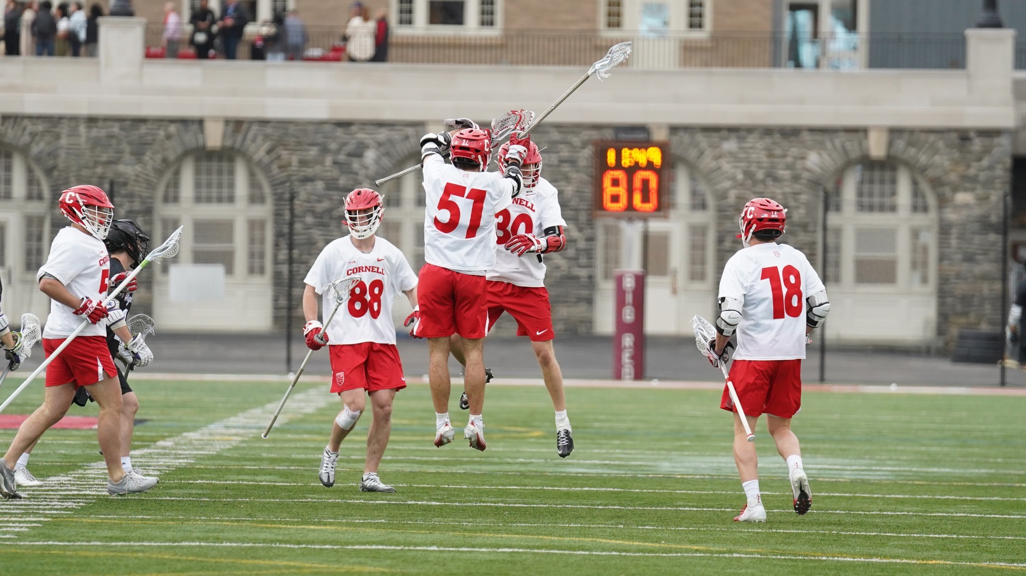 Willem Firth and Ryan Goldstein celebrate a goal in win over High Point on Monday, April 13, 2026 at Schoellkopf Field