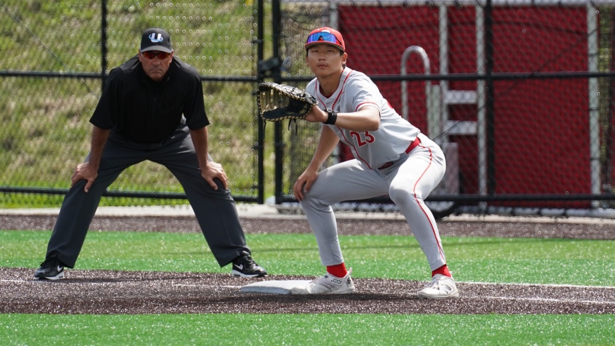 Cornell baseball sophomore first baseman Jayden Shin holds a Yale runner on first base during game action at Booth Field in Ithaca, N.Y., on April 18, 2026.