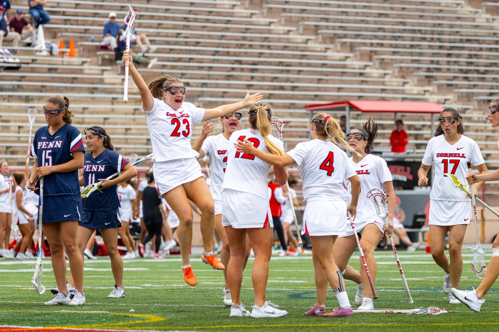 Ellie Bergin #32 celebrates with teammates after scoring a goal vs. UPenn
