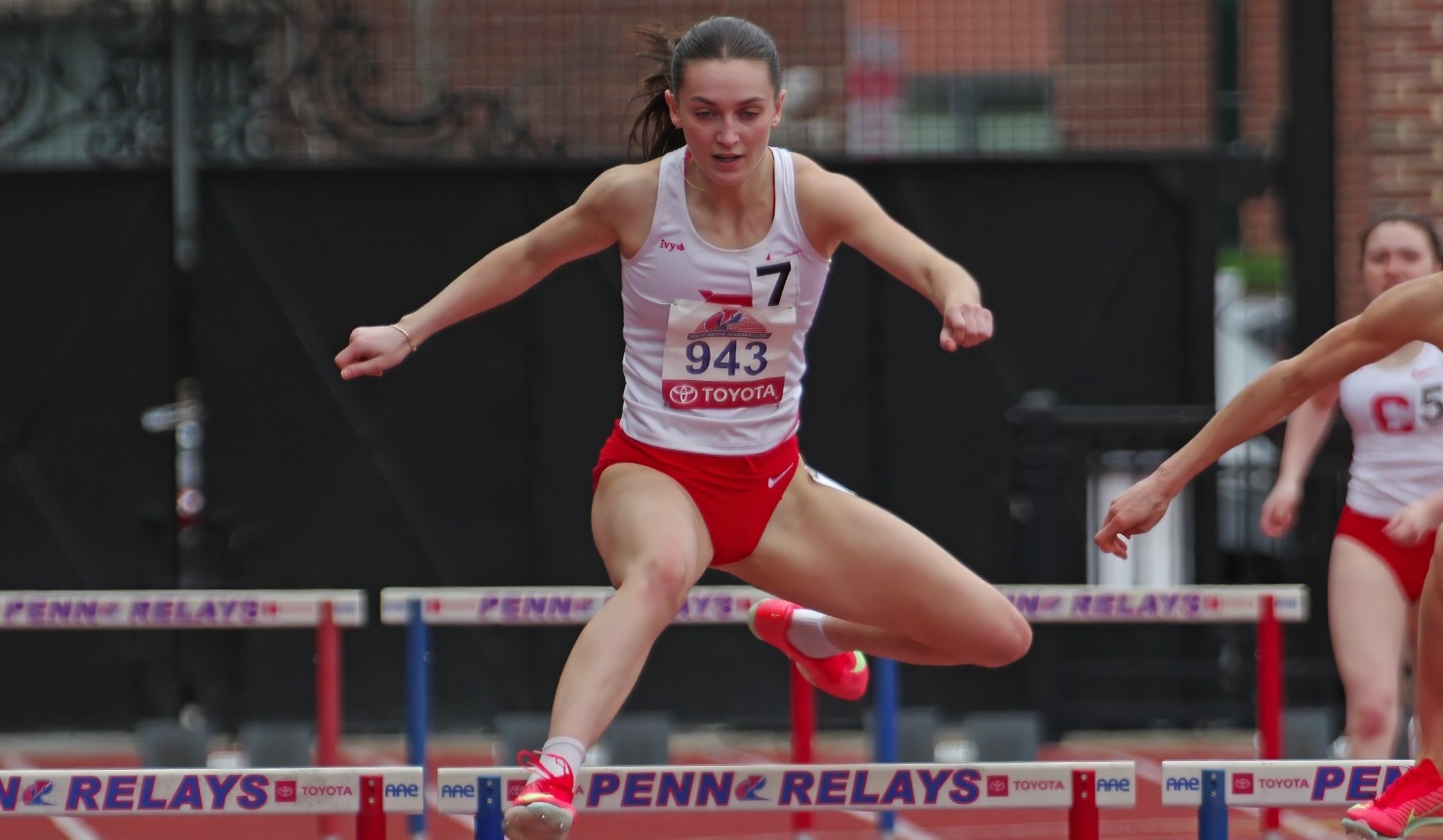 Elise Sawyer competing in 100m hurdles