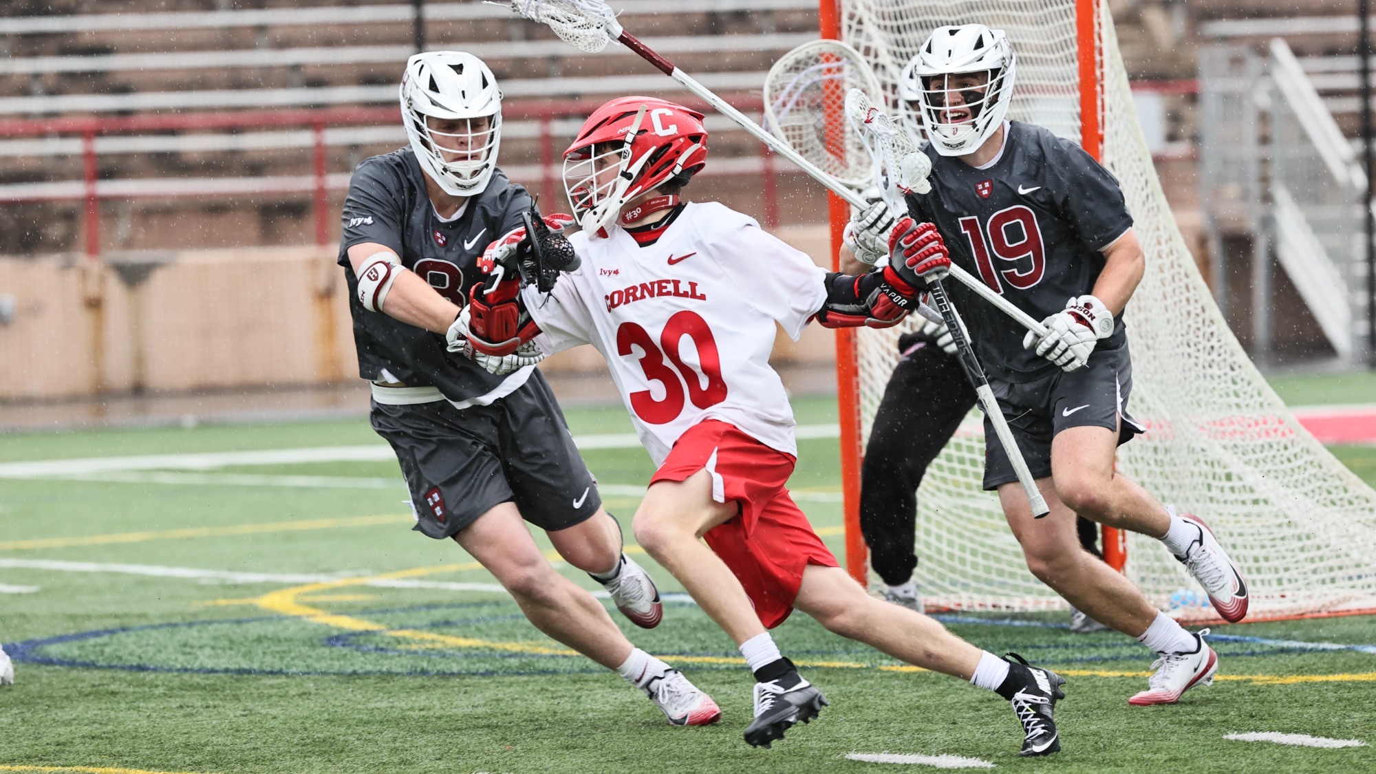 Ryan Goldstein navigates the Crimson defense during Cornell Men's Lacrosse's 11-9 win over #10 Harvard on Saturday, April 25 at Schoellkopf Field. 