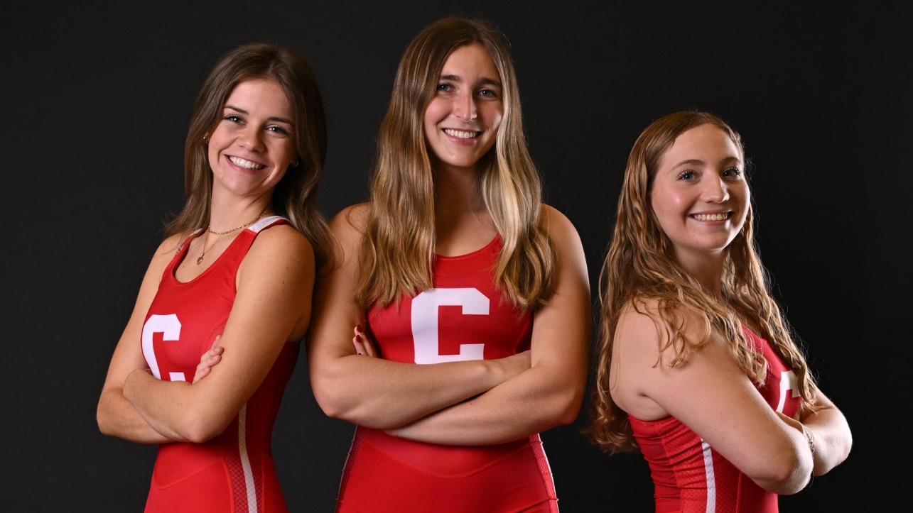 Cornell women's rowers Emmy Tyrcha, Josie Moskovitz and Hannah Woodhull pose for media day photos before the 2025 season.