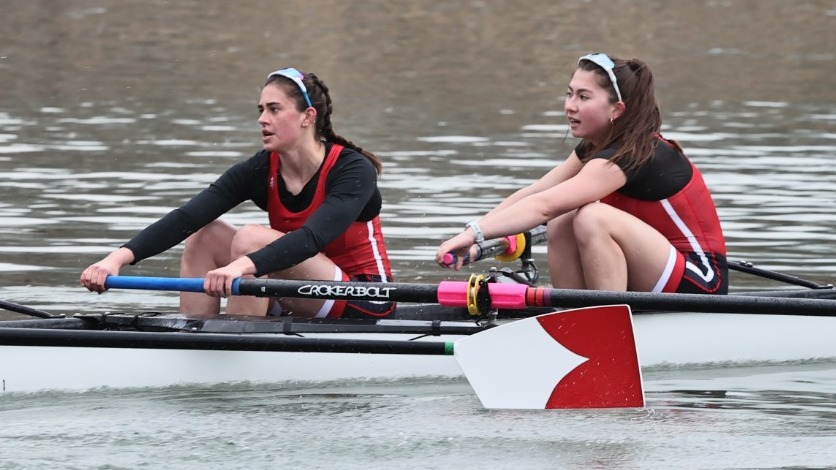 Cornell women's rowers Zoe Benitez and Isabella Capelli compete during the 2024-25 season.
