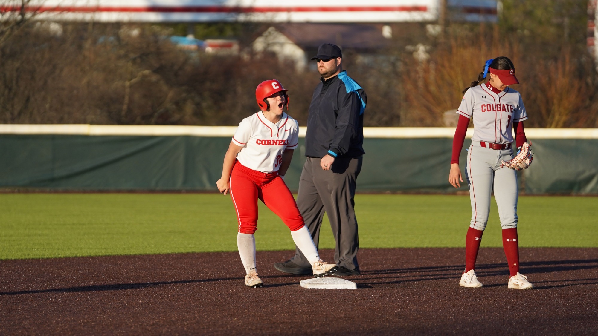 Holt celebrates a game-tying double against Colgate at Niemand-Robison Field.
