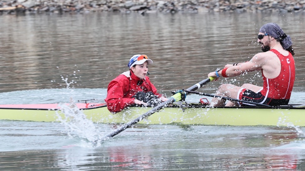 Cornell men's heavyweight rowing coxswain Sofie Cole directs a boat during race action against Drexel during the 2025 season on the Cayuga Inlet in Ithaca, N.Y.