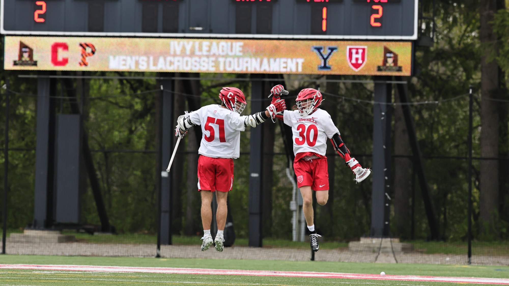 Willem Firth (51) and Ryan Goldstein (30) Celebrate a Goal in Cornell Men's Lacrosse's Ivy League Semifinal Win over Harvard, 17-8, Friday, May 1, 2026 at Schoellkopf Field in Ithaca, N.Y.