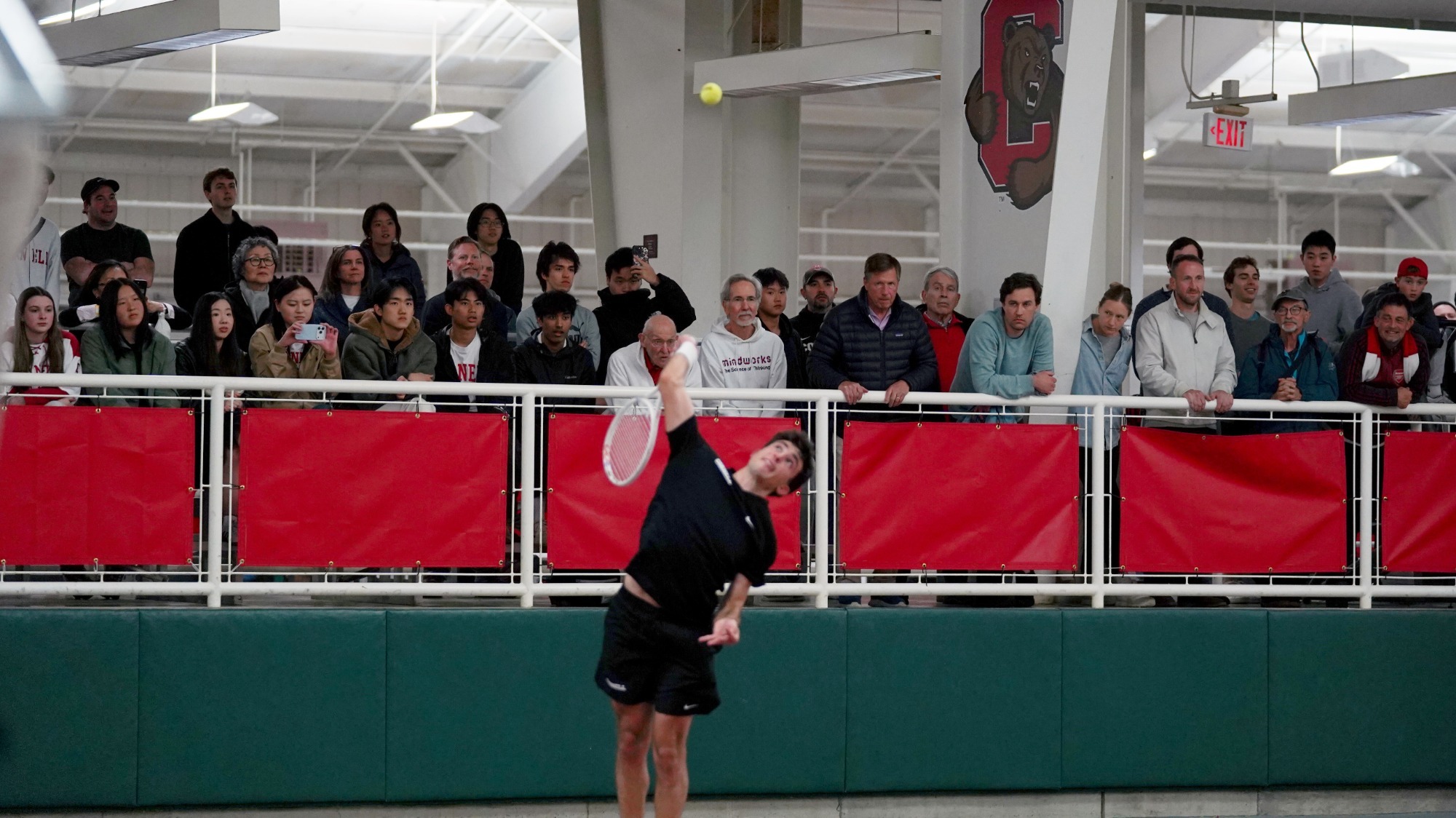 Rodrigo Fernandes ’28 serves to Columbia’s Michael Zheng during the decisive singles match in the Big Red’s 4-3 victory April 25 at Reis Tennis Center in Ithaca.
