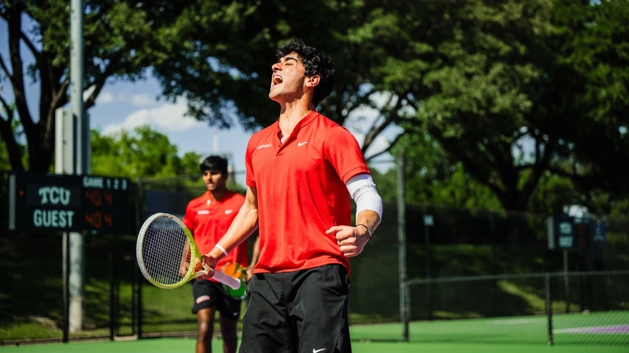 Rushil Khosla celebrates a point during the a doubles win for the Big Red men's tennis team over TCU in the second round of the NCAA Tournament on May 2, 2026 in Fort Worth, Texas.