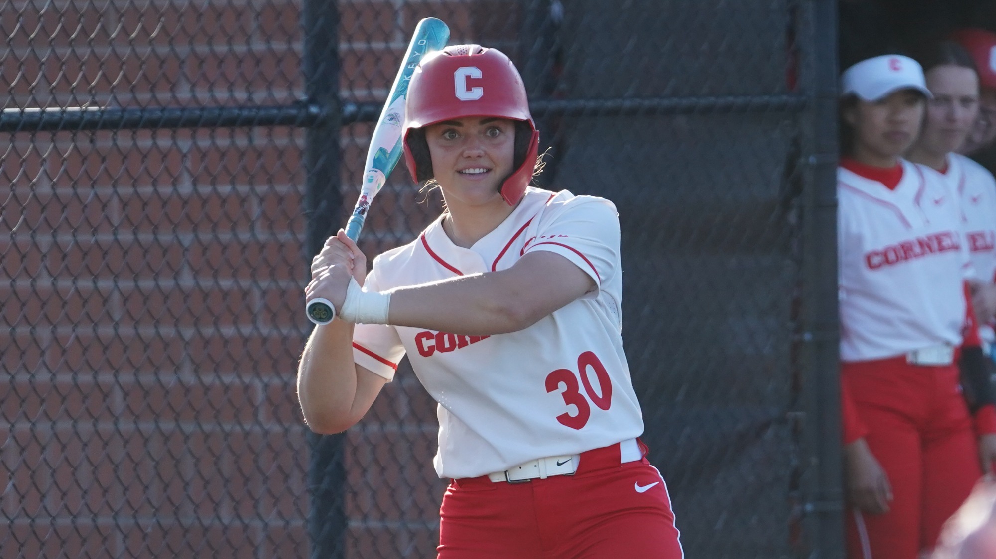 Lauren Holt practices her swing before stepping into the batters box at Niemand-Robison Field.