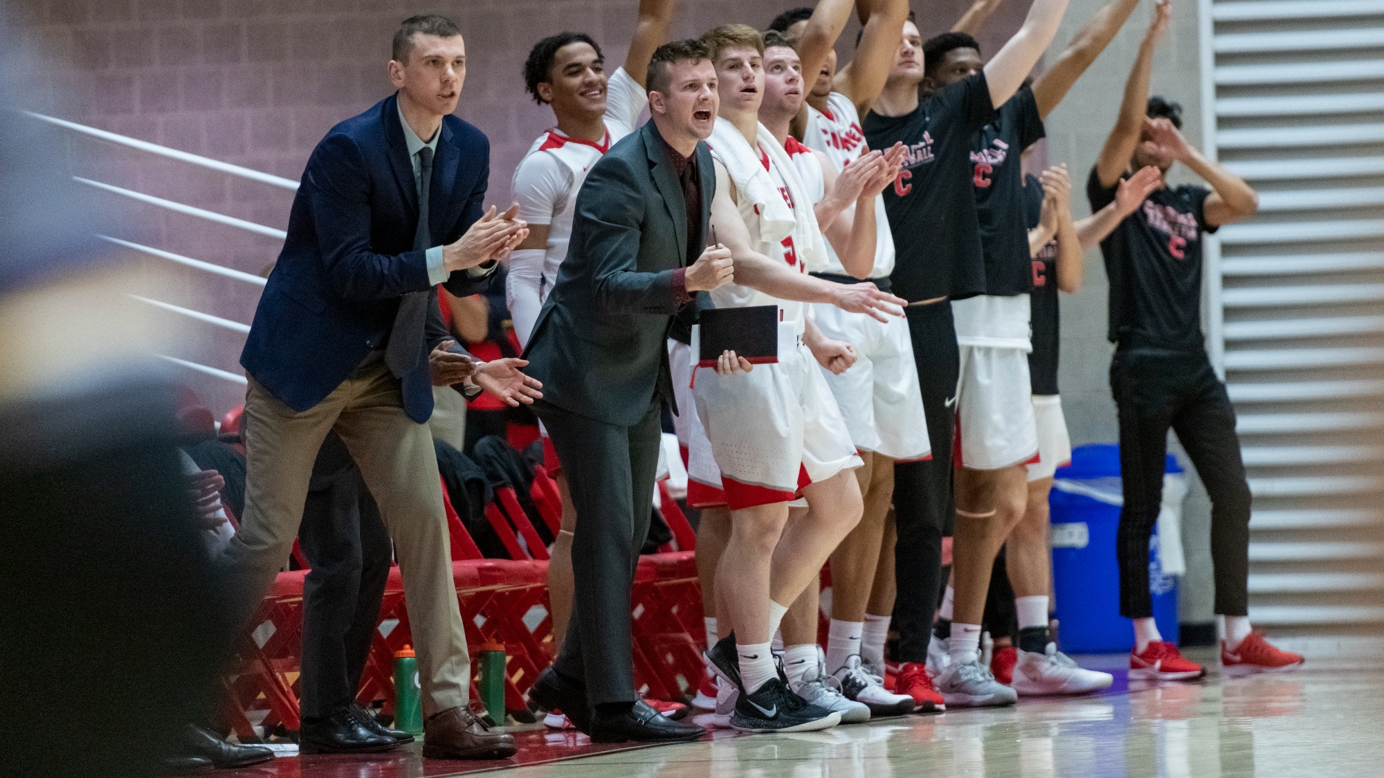 Clay Wilson on the bench for the Big Red during the 2019-20 season.