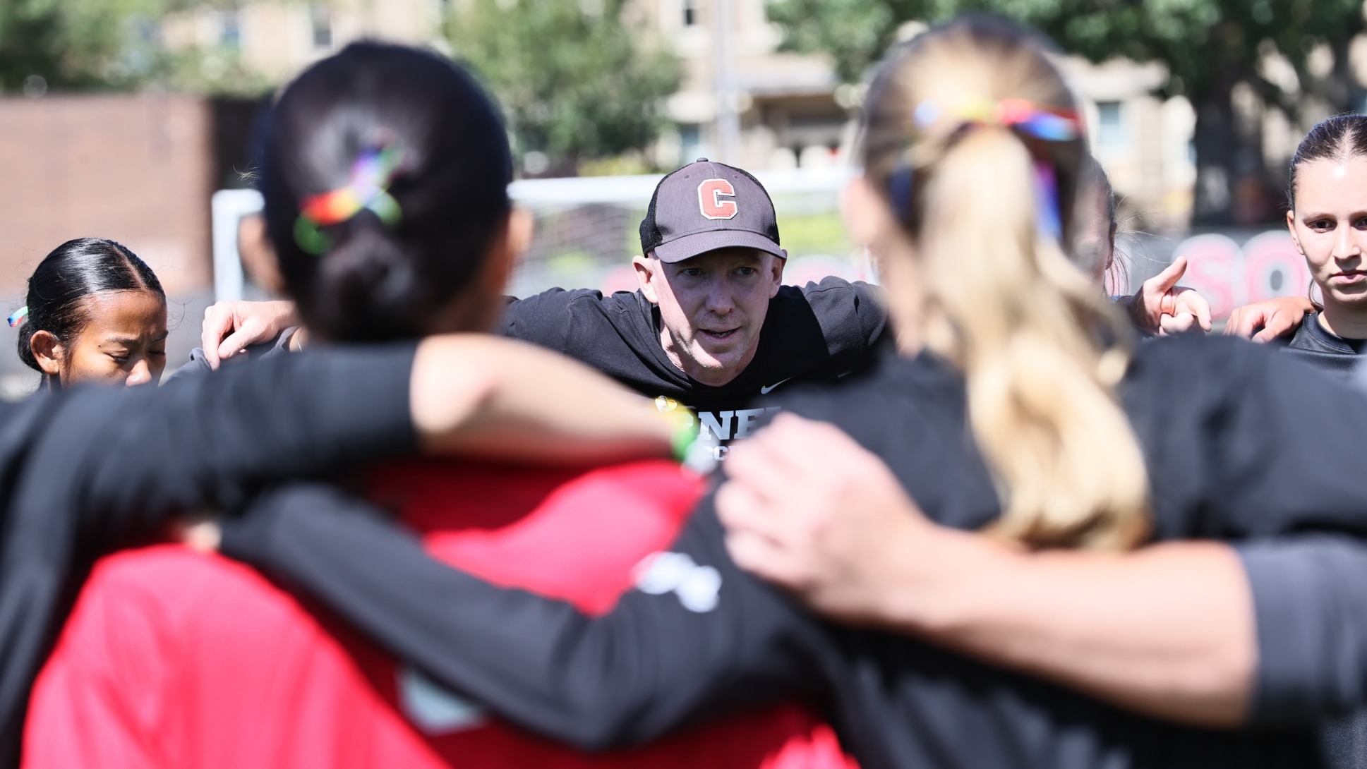 Cornell women's soccer head coach Rob Ferguson speaks to his team in a huddle during match action against Columbia on Sept. 20, 2025, at Berman Field in Ithaca, N.Y.