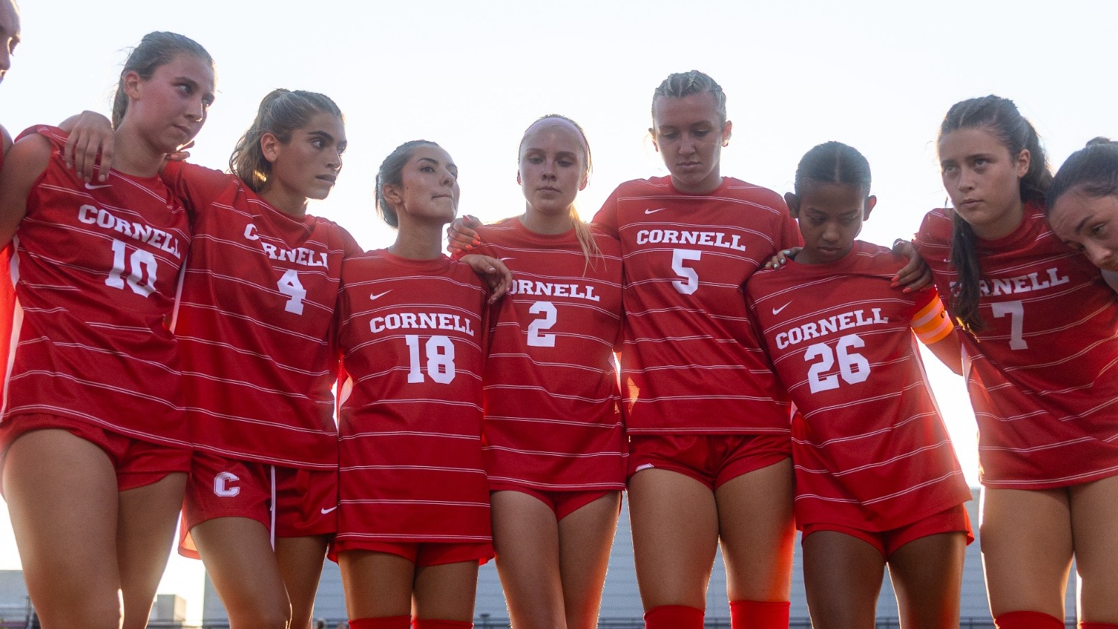 Members of the Cornell women's soccer team huddle after their scrimmage against Monroe University at Berman Field in Ithaca, N.Y., on Aug. 15, 2026.