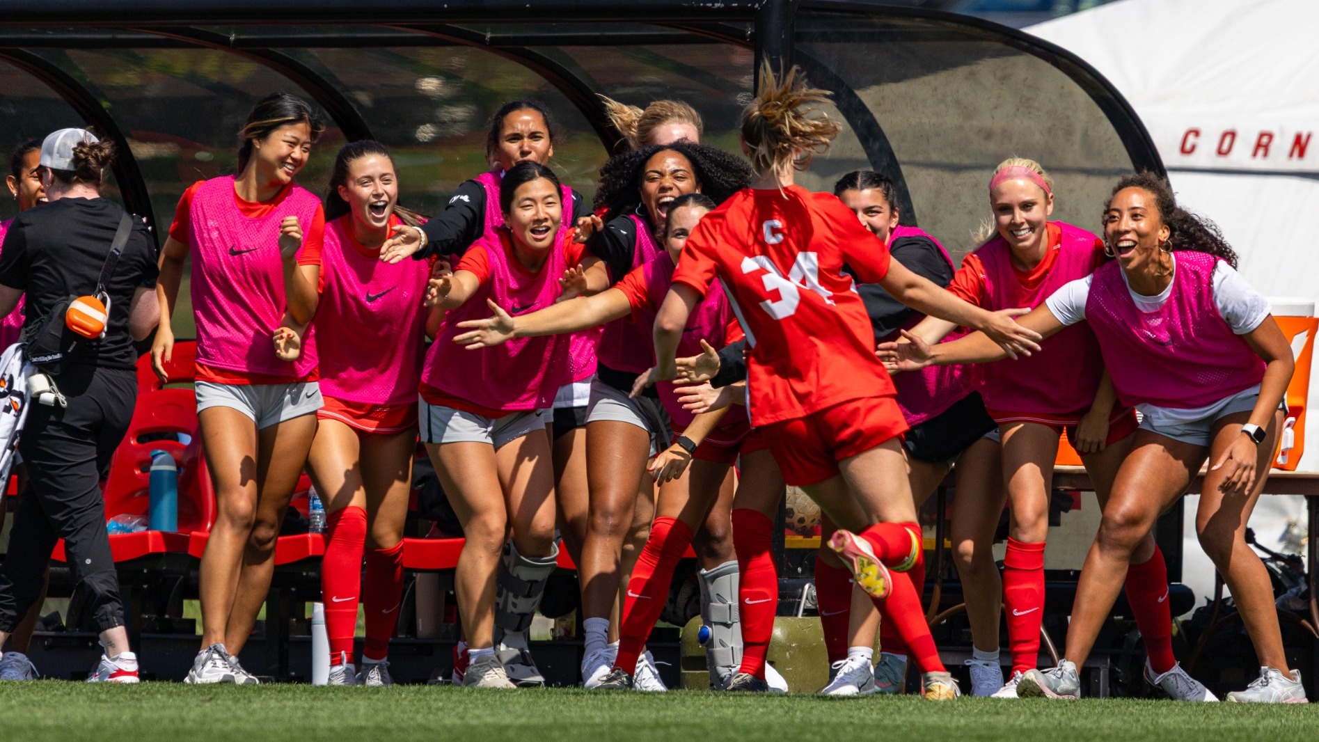 Cornell women's soccer senior midfielder and co-captain Emily Gibbons celebrates with teammates after scoring against Boston College on Aug. 23, 2026, at Berman Field in Ithaca, N.Y.