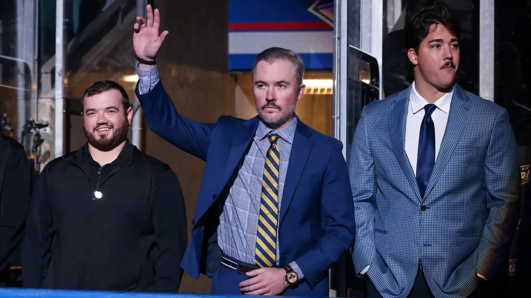 Austin Keiser, Cornell's newly-hired director of men's hockey operations and video coordinator, waves to fans during pre-game introductions at the Toledo Walleye's home opener for the 2025-26 season.