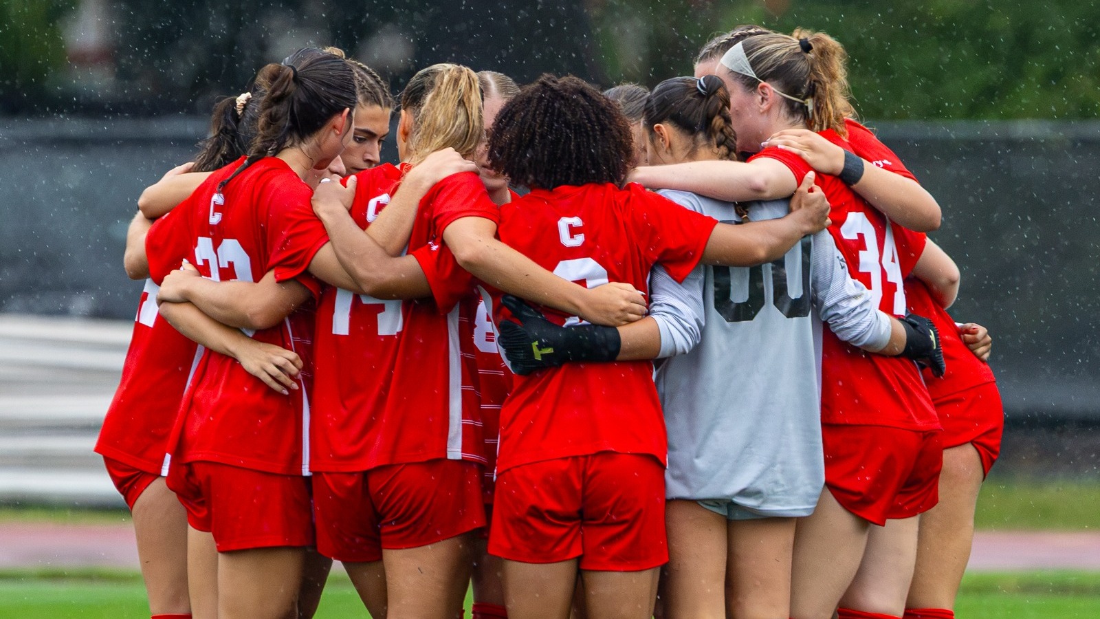 Members of the Cornell women's soccer team huddle before the beginning of their match against St. Bonaventure at Berman Field in Ithaca, N.Y., on Aug. 20, 2026.