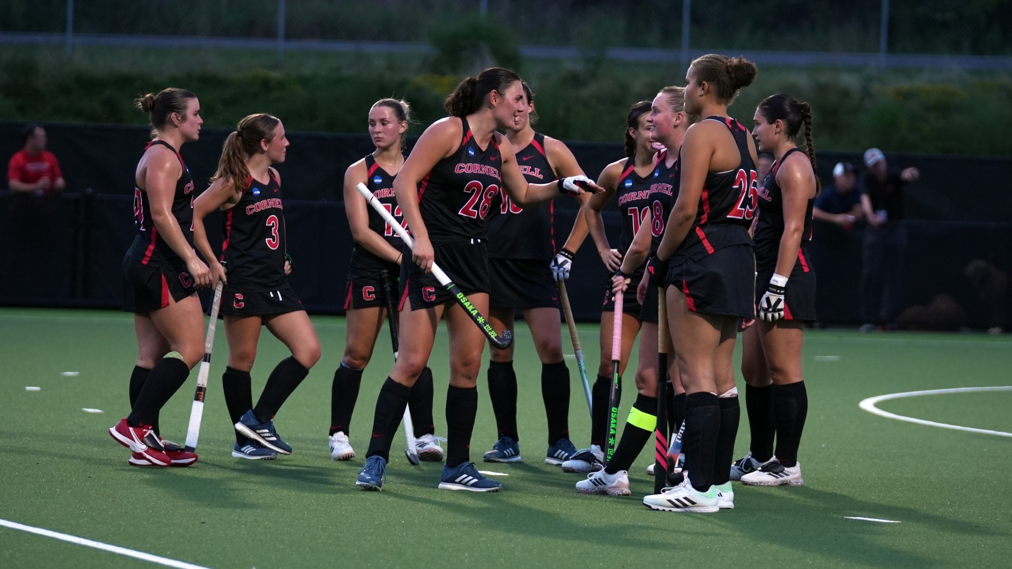 The Cornell field hockey team gathers to prepare for a penalty corner during its 5-0 win over La Salle on Sept. 4, 2026 at Marsha Dodson Field in Ithaca, N.Y.