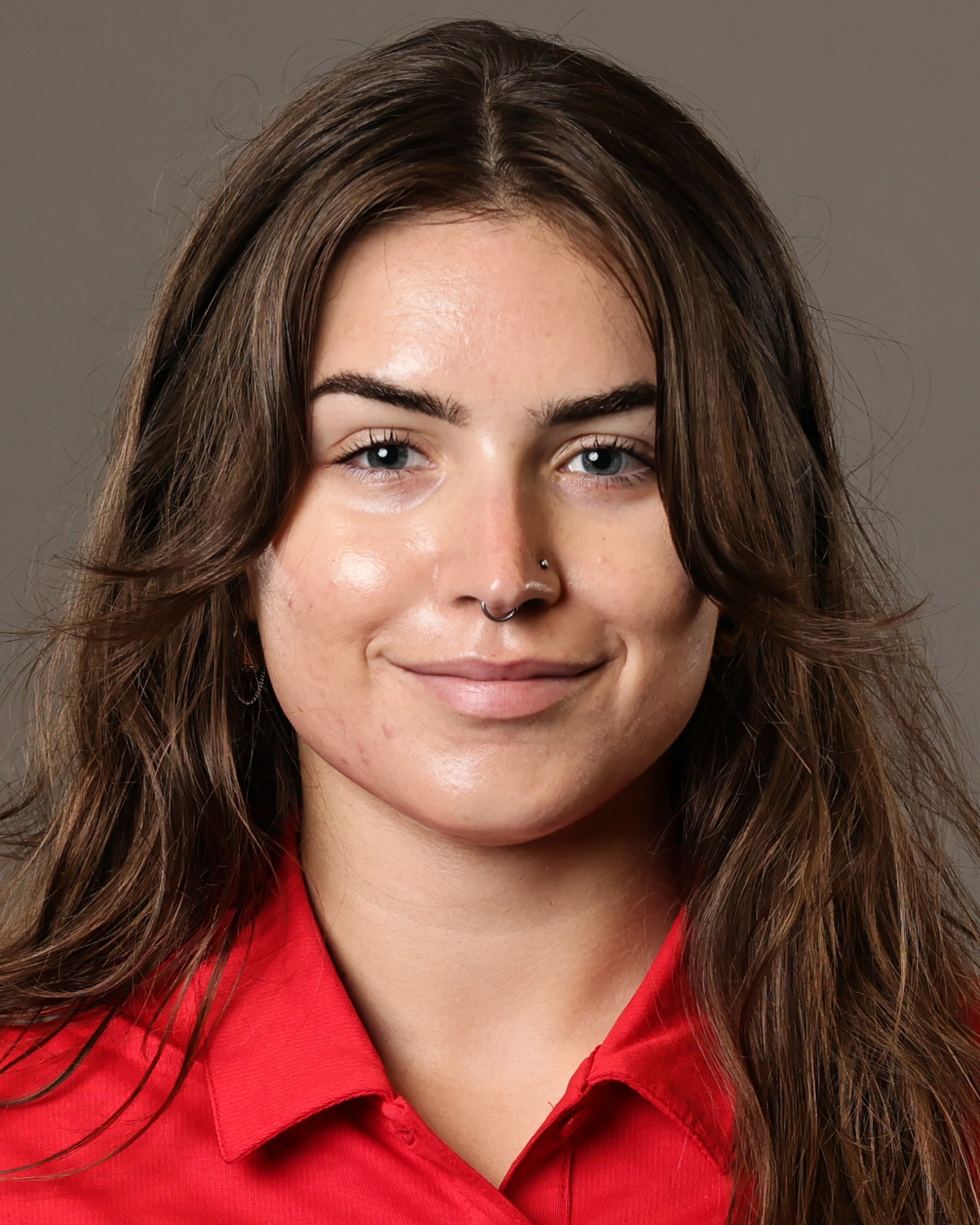 Members of the Cornell women's rowing team pose for headshots for the 2026-27 academic year on Sept. 2, 2026, inside the Hall of Fame Room in Schoellkopf Hall in Ithaca, N.Y.