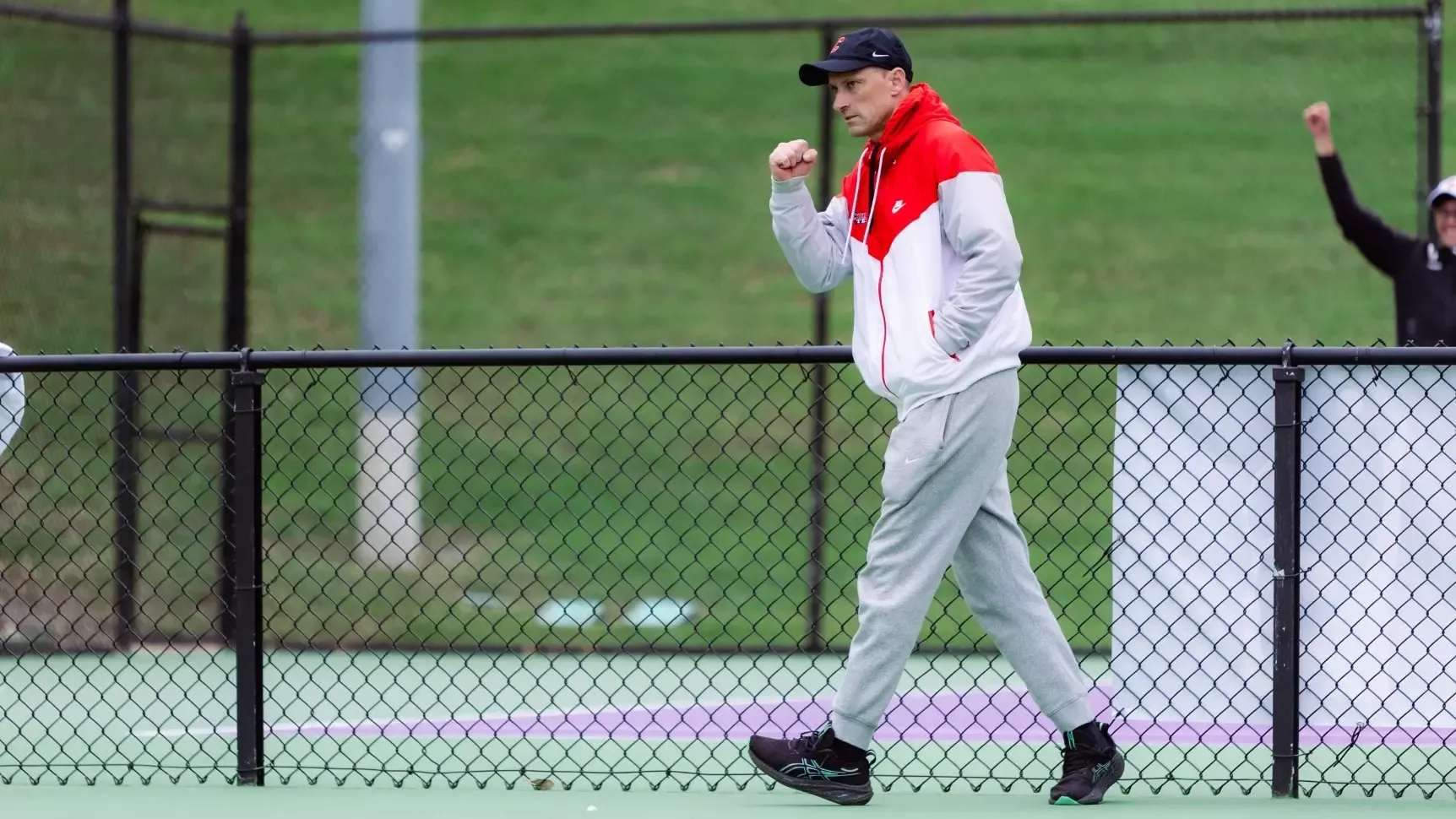 Silviu Tanasoiu, the Director of Intercollegiate Tennis and Savitt-Weiss Head Coach of Cornell Men's Tennis, celebrates during match action against Arkansas in the 2026 NCAA Tournament in Fort Worth, Texas, on May 1, 2026.