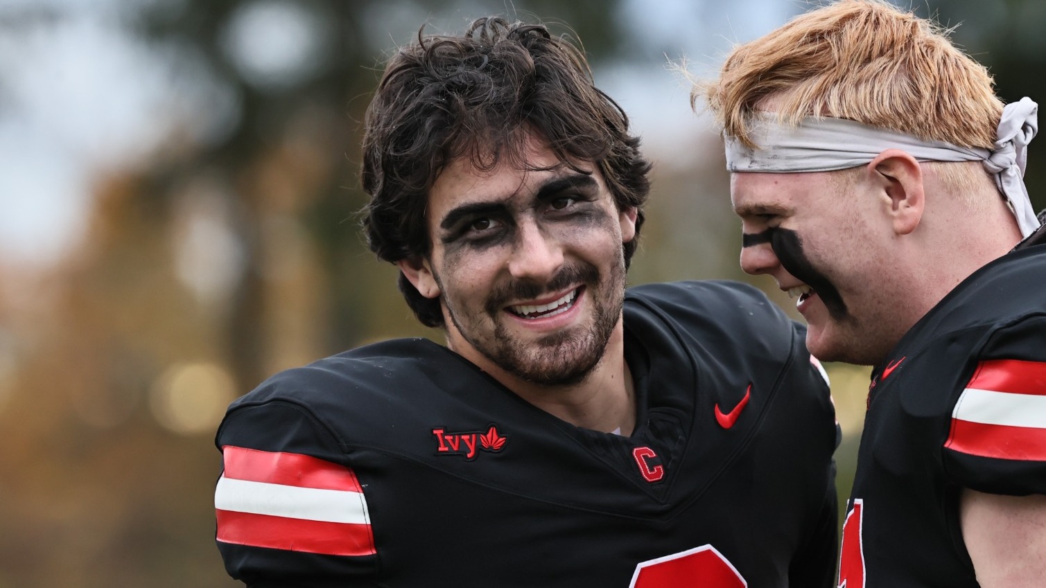 Garrett Bass-Sulpizio and Tim Buren celebrate after a home win during the 2025 season