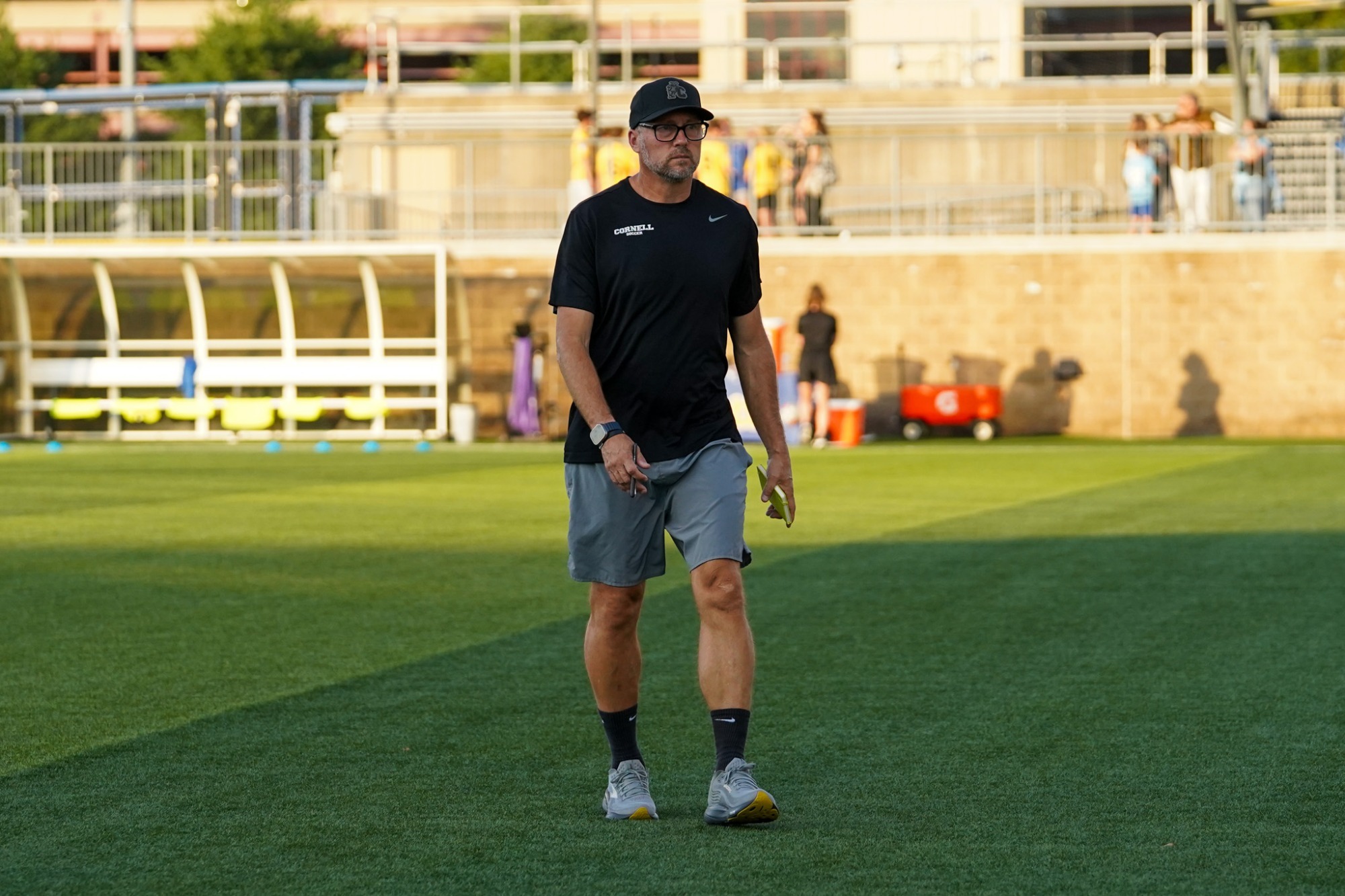 Head Coach John Smith walks across the field at Pitt