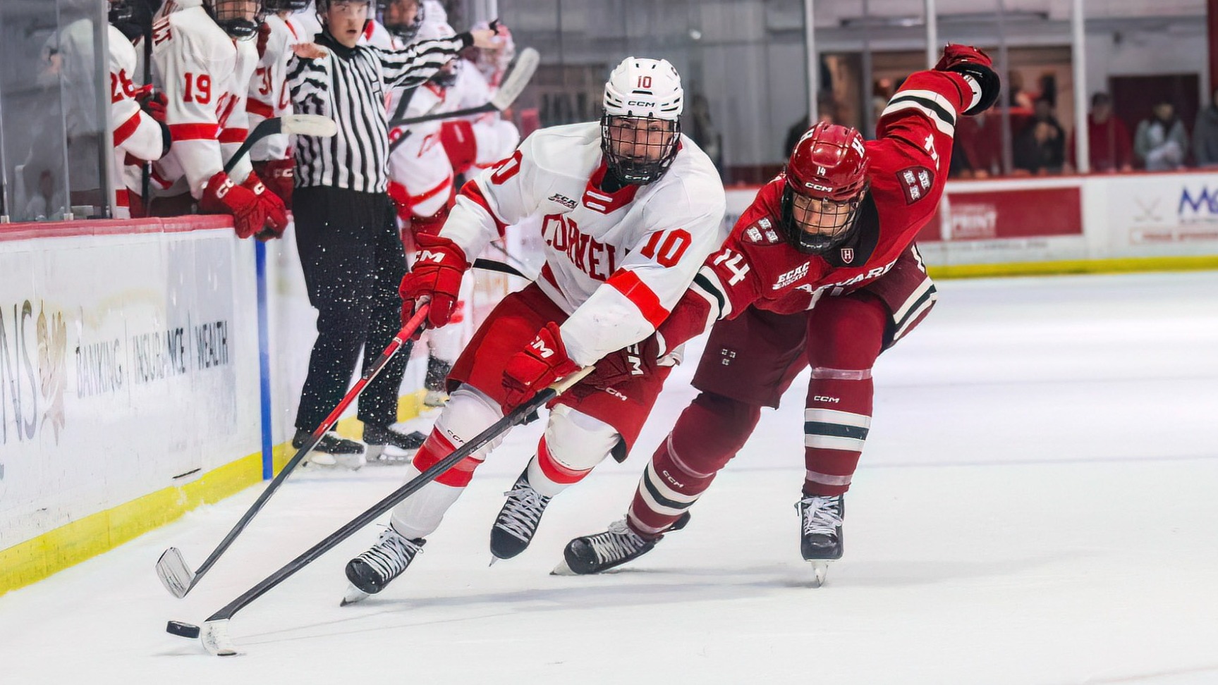 Cornell men's hockey junior forward Jake Kraft carries the puck during game action against Harvard at Lynah Rink in Ithaca, N.Y., on March 13, 2026.