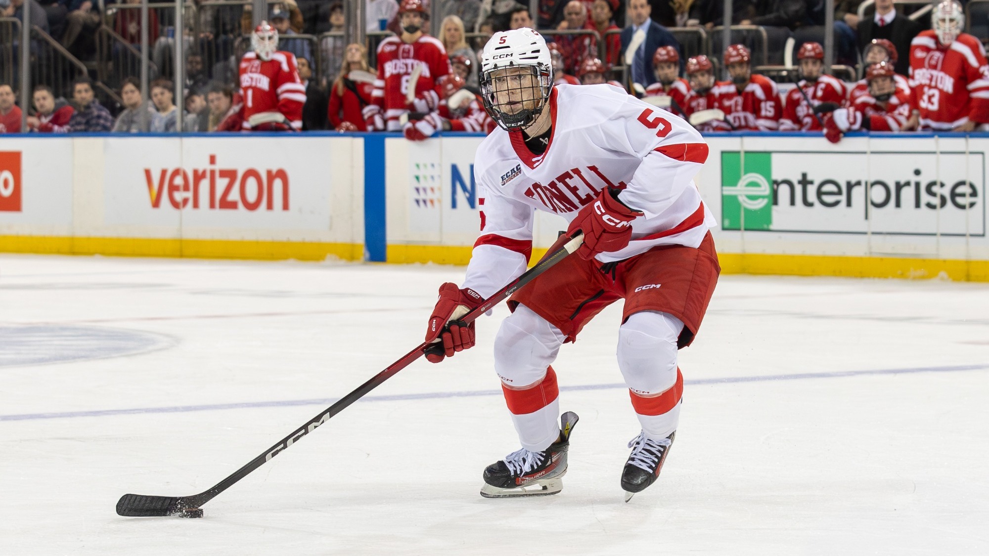 Cornell men's hockey junior defenseman Hoyt Stanley carries the puck during game action against Boston University at Red Hot Hockey at Madison Square Garden in New York City on Nov. 28, 2025.