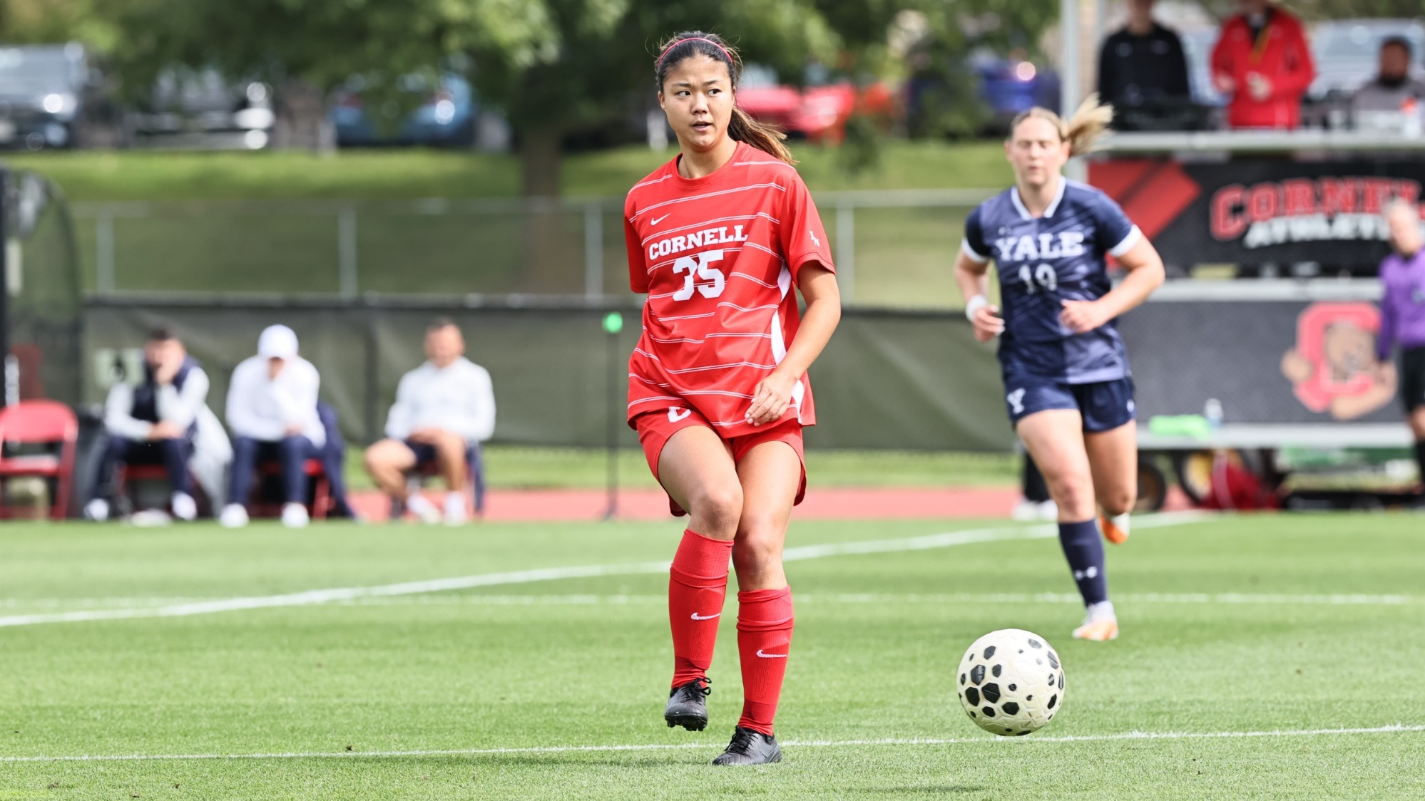 Cornell women's soccer senior midfielder Ava Jung makes a pass during match action against Yale at Berman Field in Ithaca, N.Y., on Sept. 26, 2026.