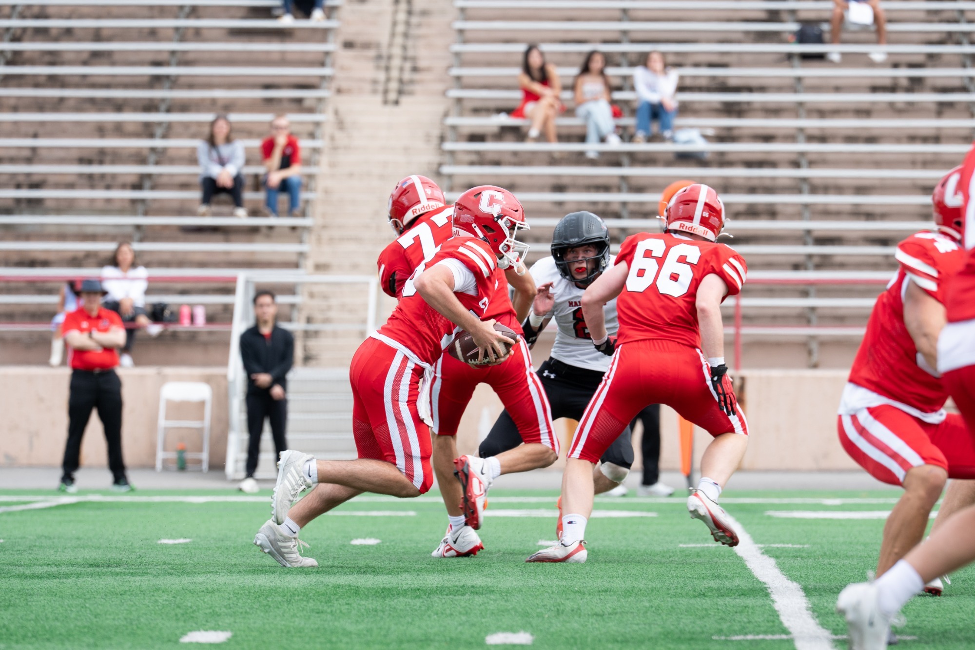 QB Stefano Luis rushes the ball