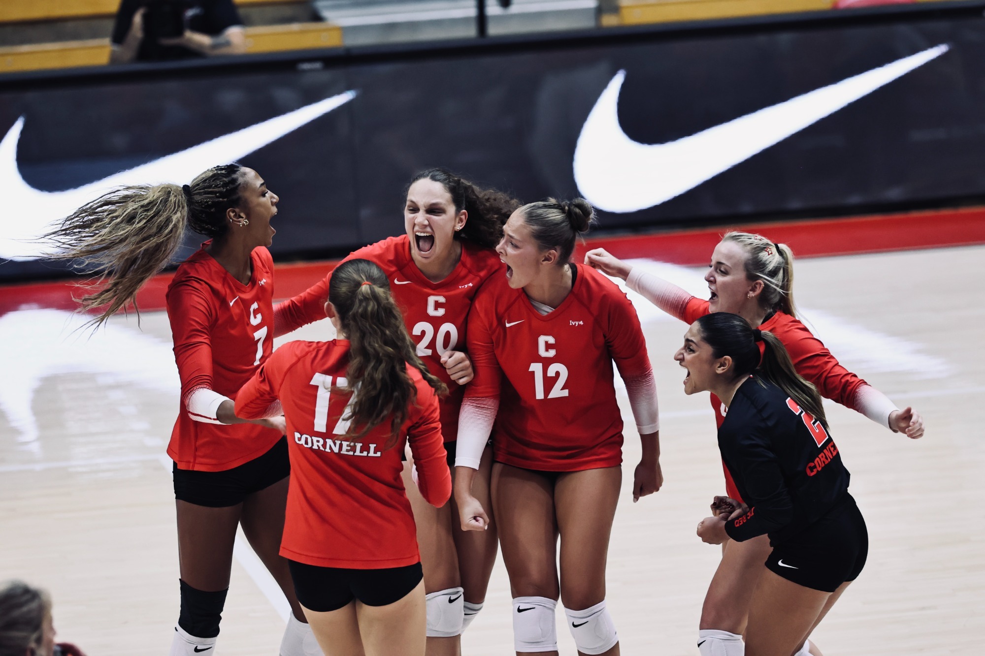 Cornell VB Celebrates after beating Howard in Home Opener in Newman Arena